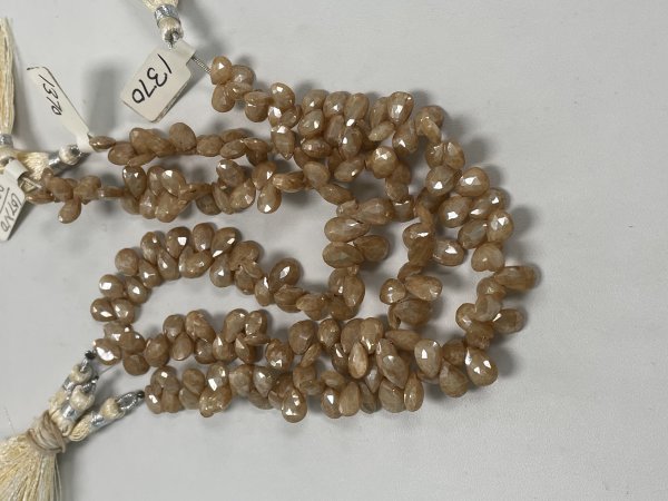 Coated Beige Silverite Pear Faceted