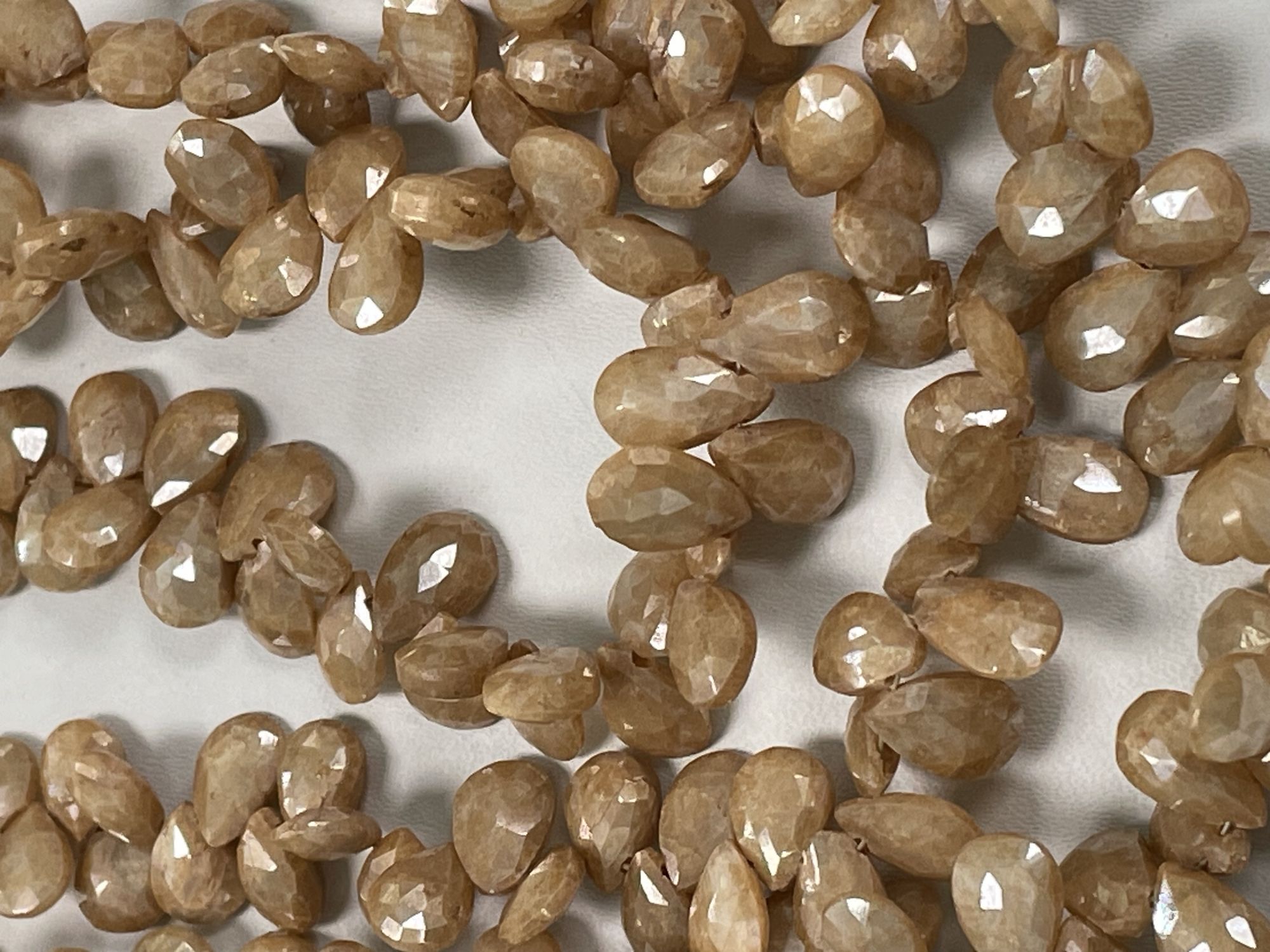 Coated Beige Silverite Pear Faceted