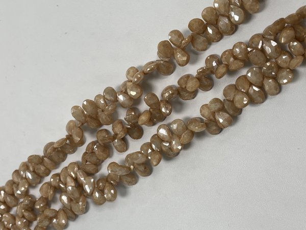 Coated Beige Silverite Pear Faceted