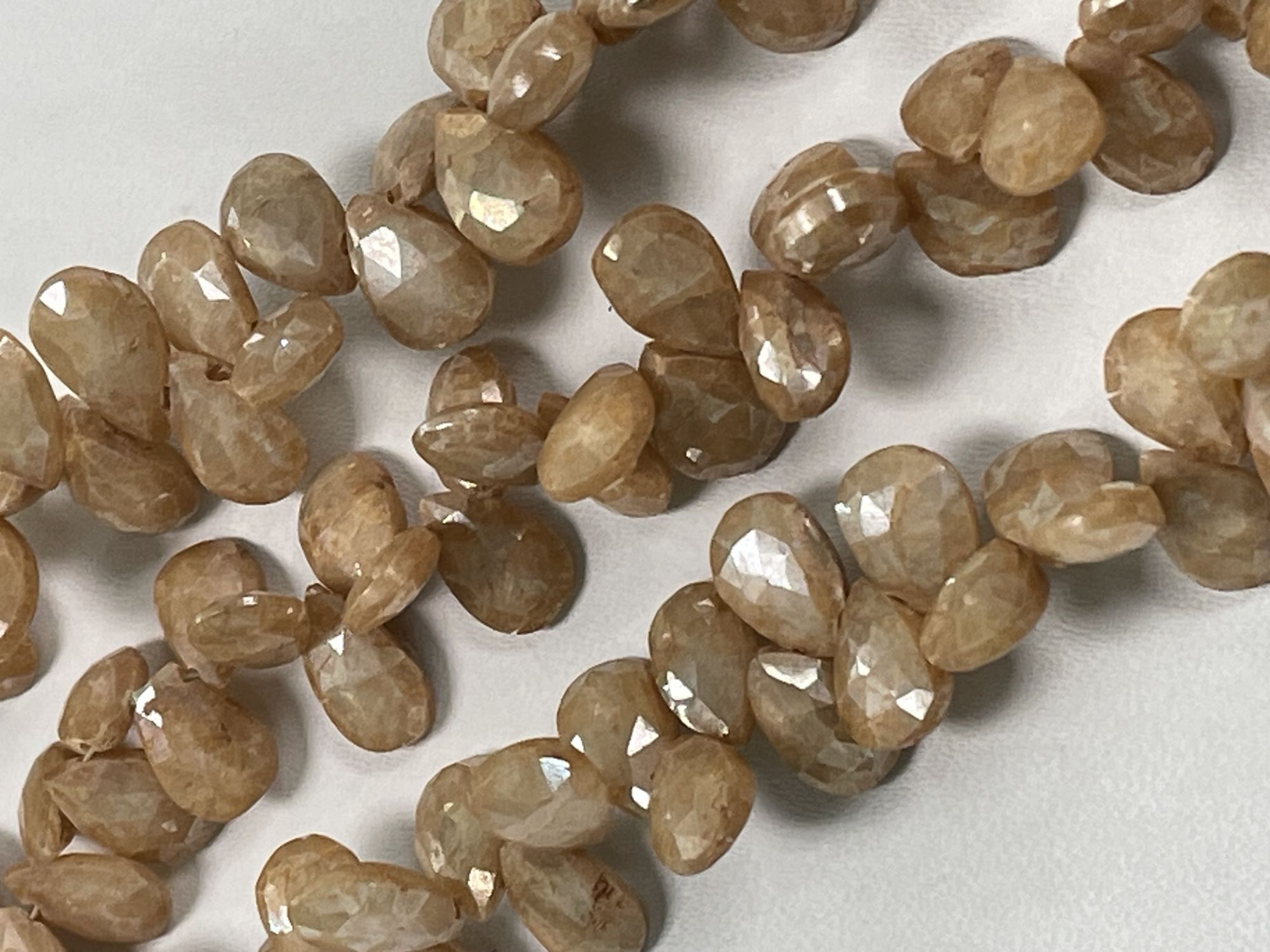 Coated Beige Silverite Pear Faceted