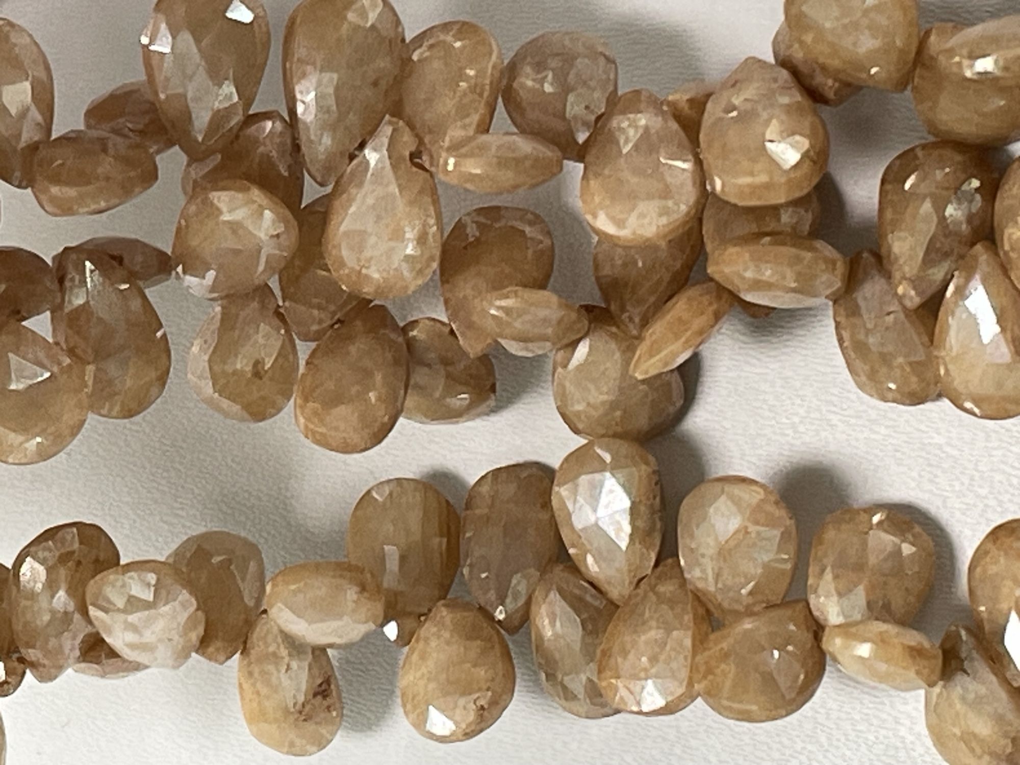 Coated Beige Silverite Pear Faceted