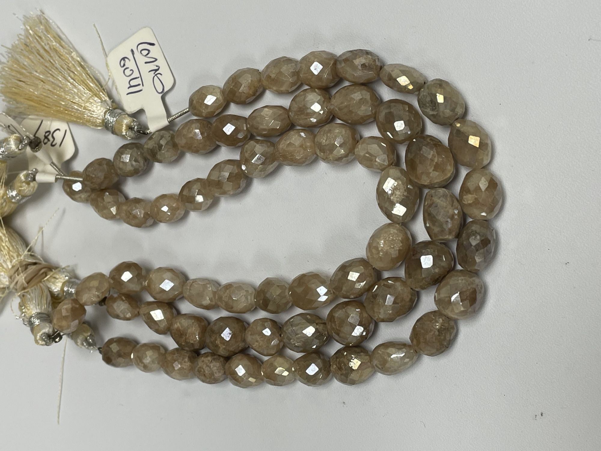 Coated Brown Grapolite Oval Faceted