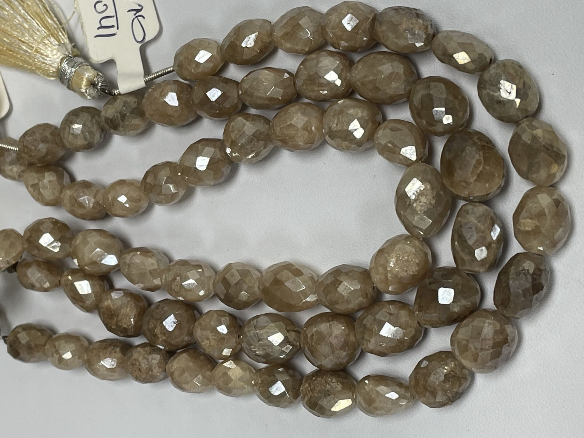 Coated Brown Grapolite Oval Faceted