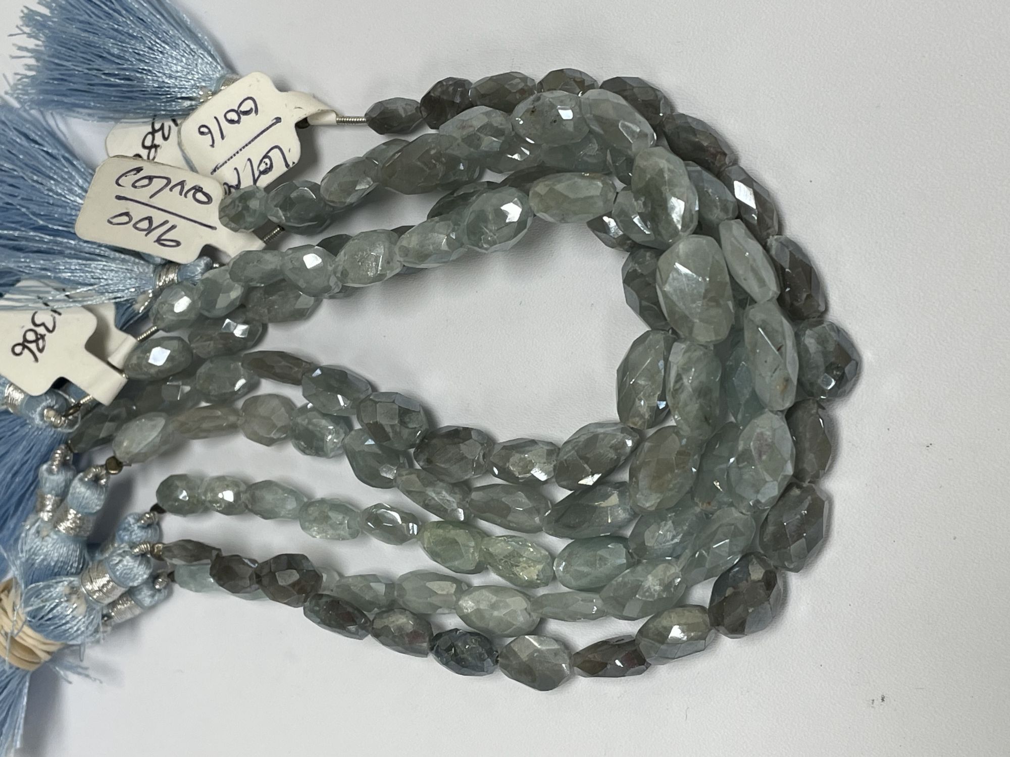 Coated Aquamarine Oval Faceted