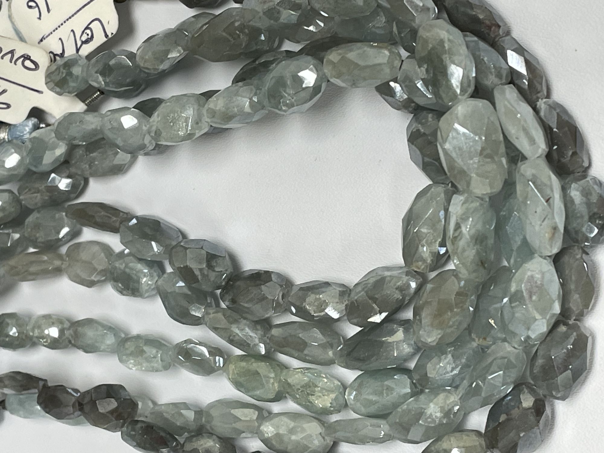 Coated Aquamarine Oval Faceted