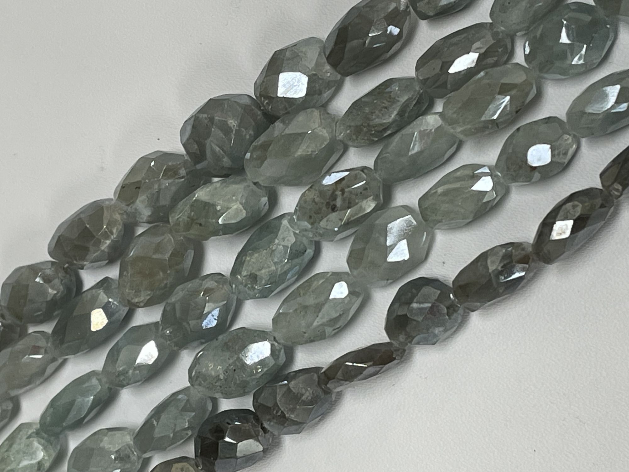 Coated Aquamarine Oval Faceted