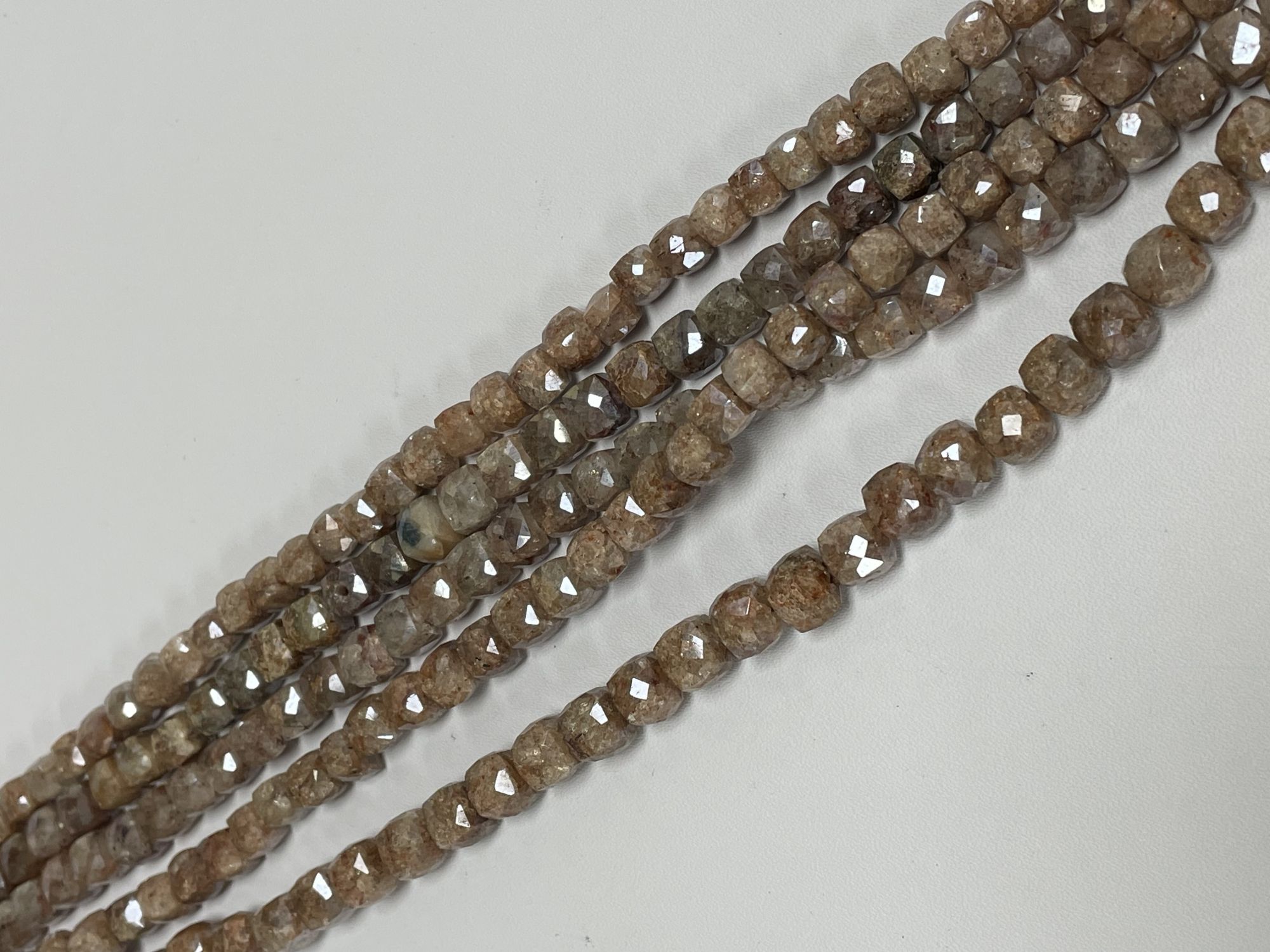 Coated Brown Silverite Cube Faceted