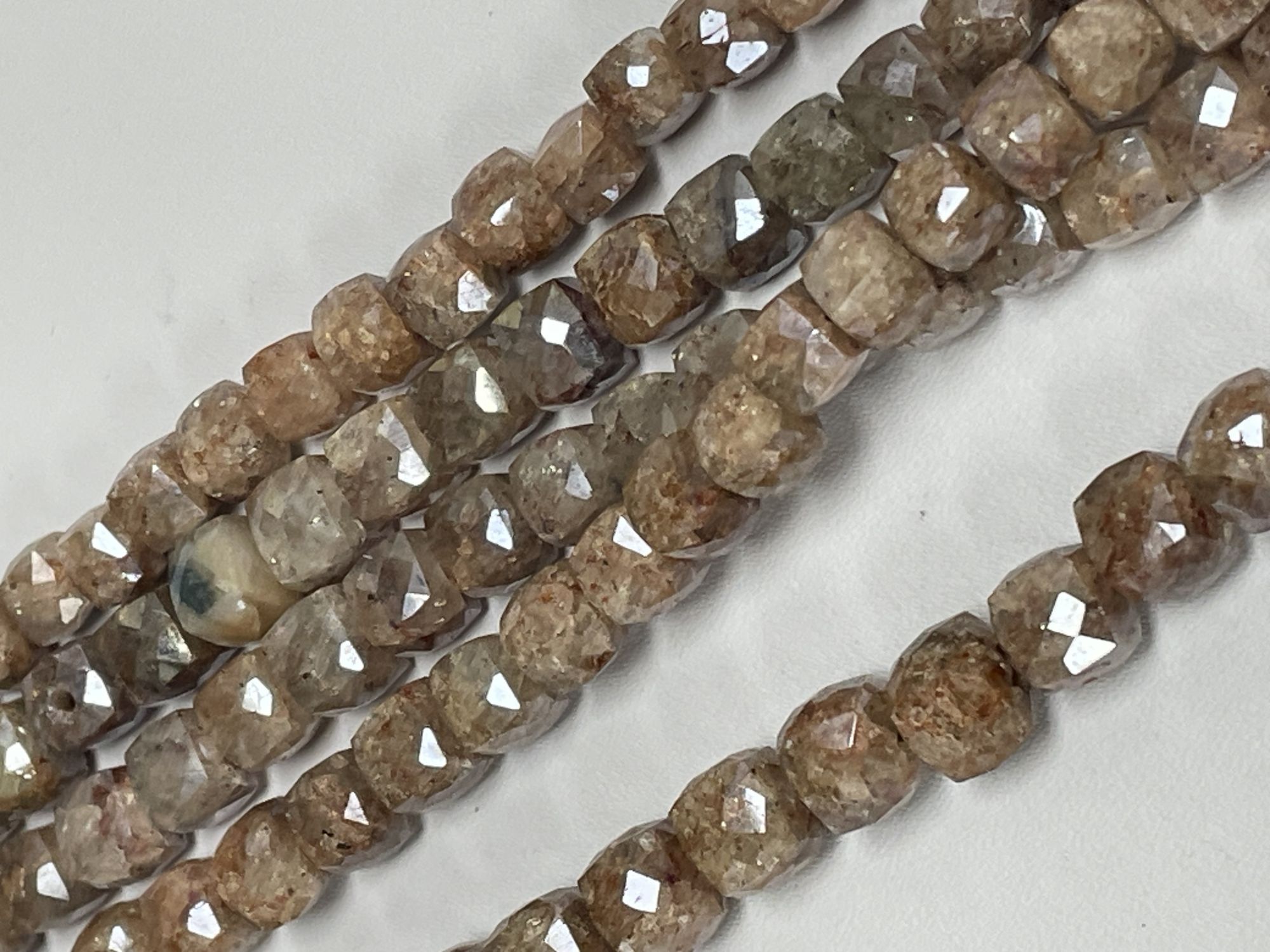 Coated Brown Silverite Cube Faceted