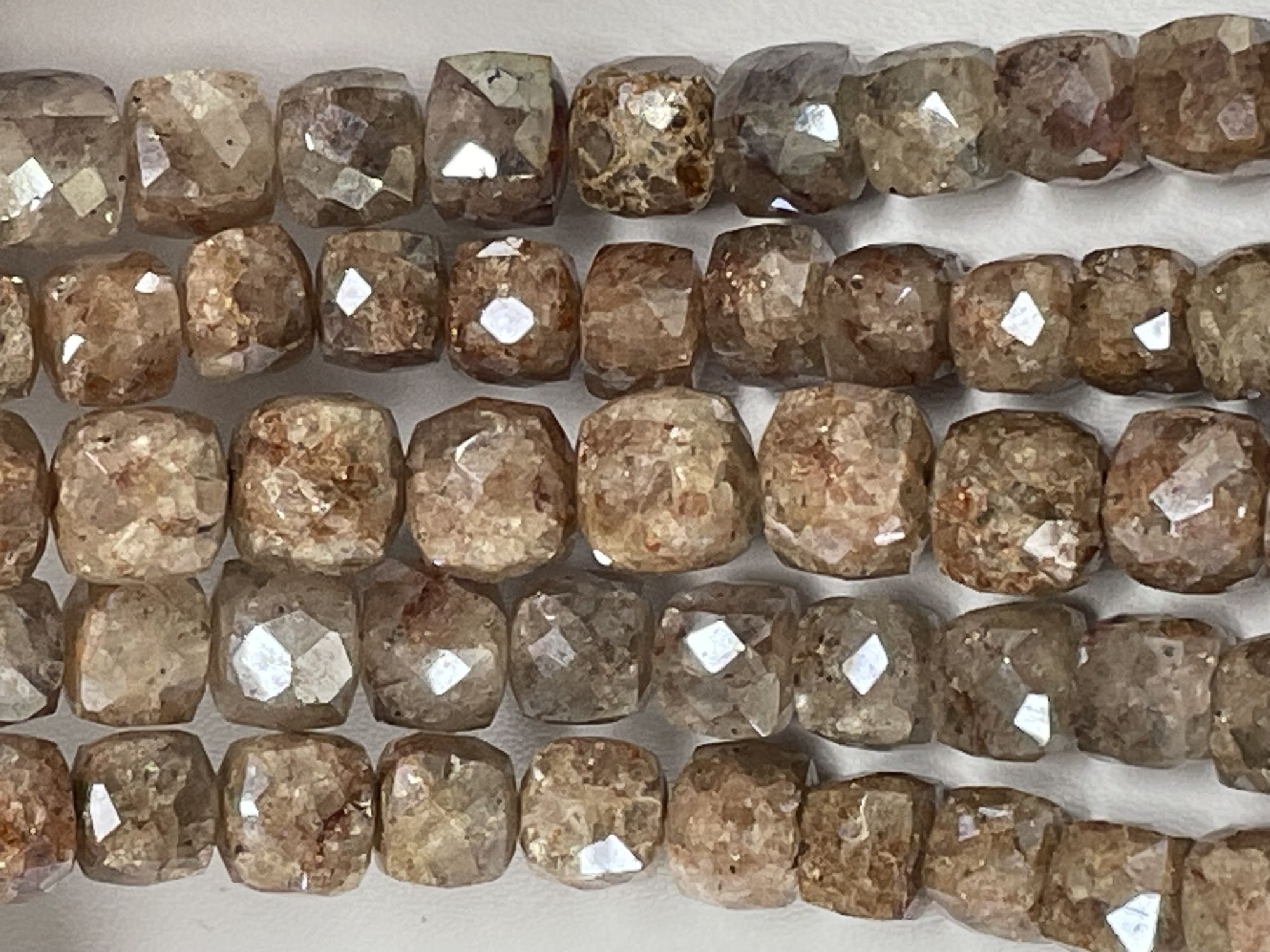 Coated Brown Silverite Cube Faceted