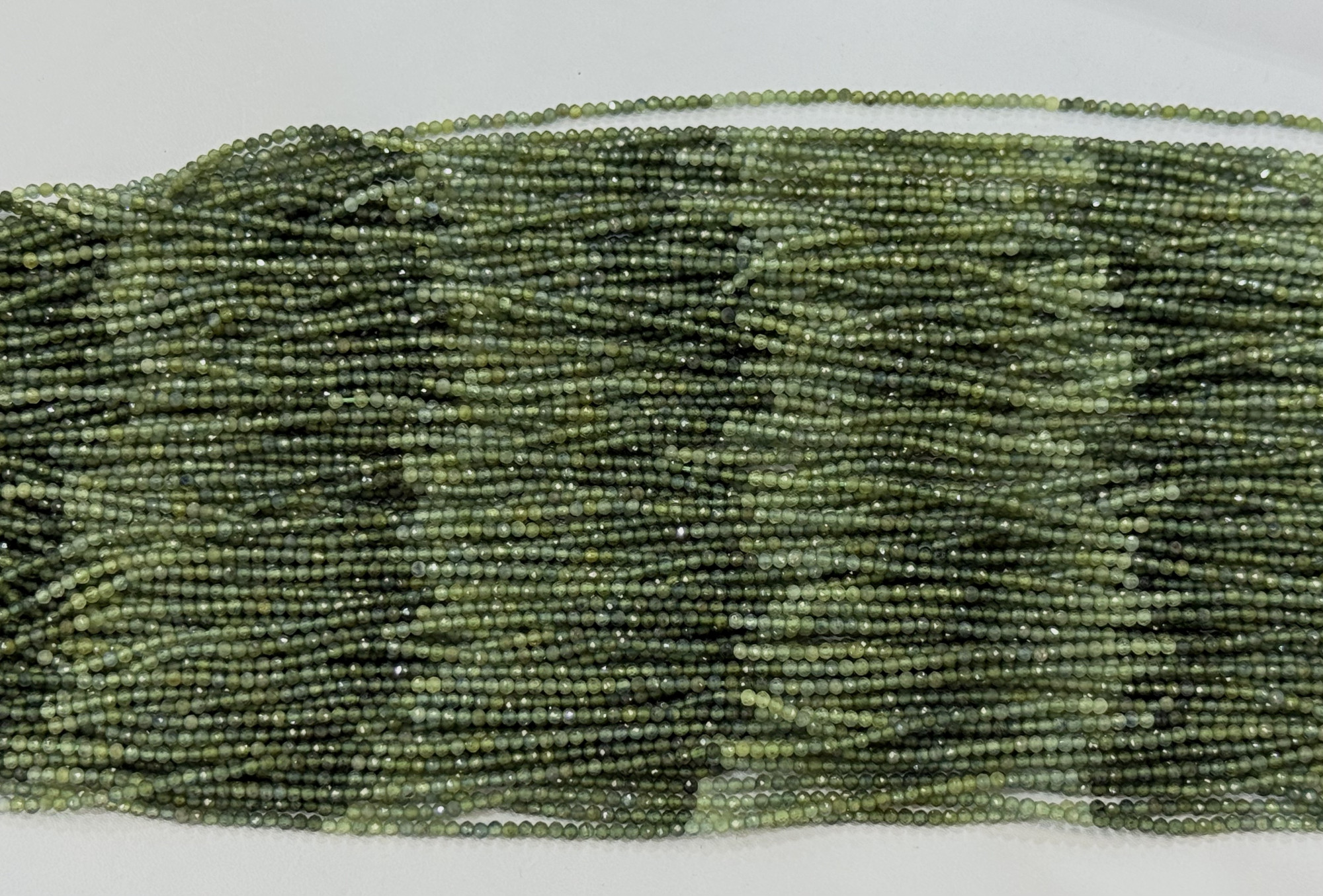 Shaded Green Sapphire Rondelle Faceted