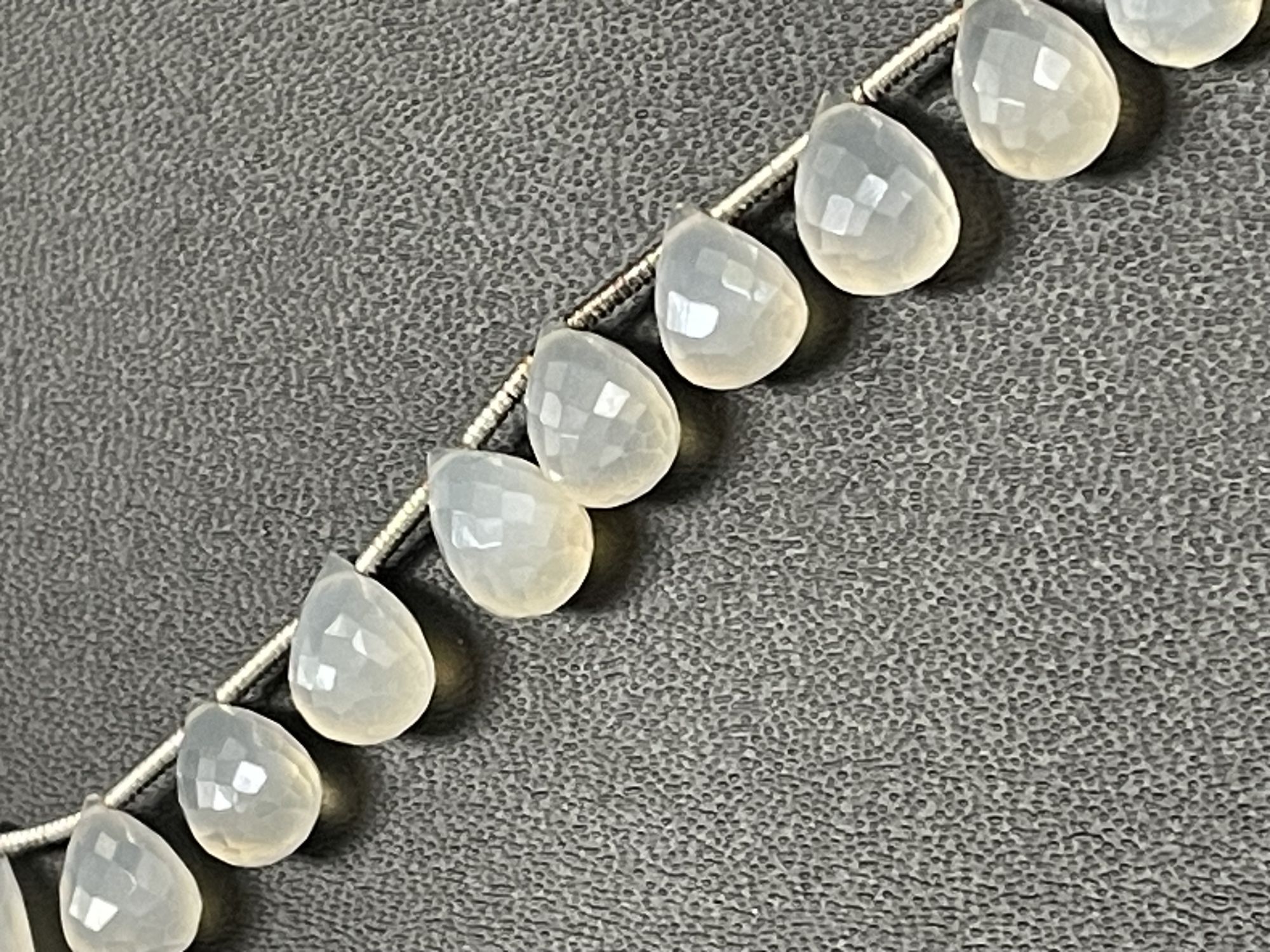 Coated Pearl White Chalcedony Drop Faceted