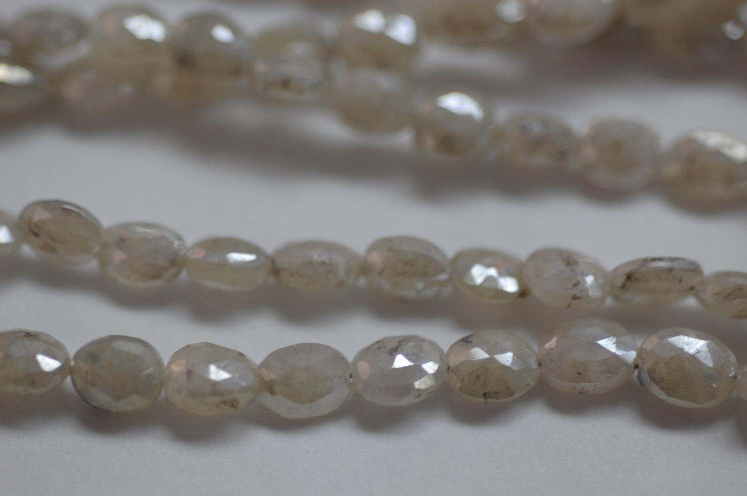 Ivory Mystic Corundum Oval Faceted (Coated)