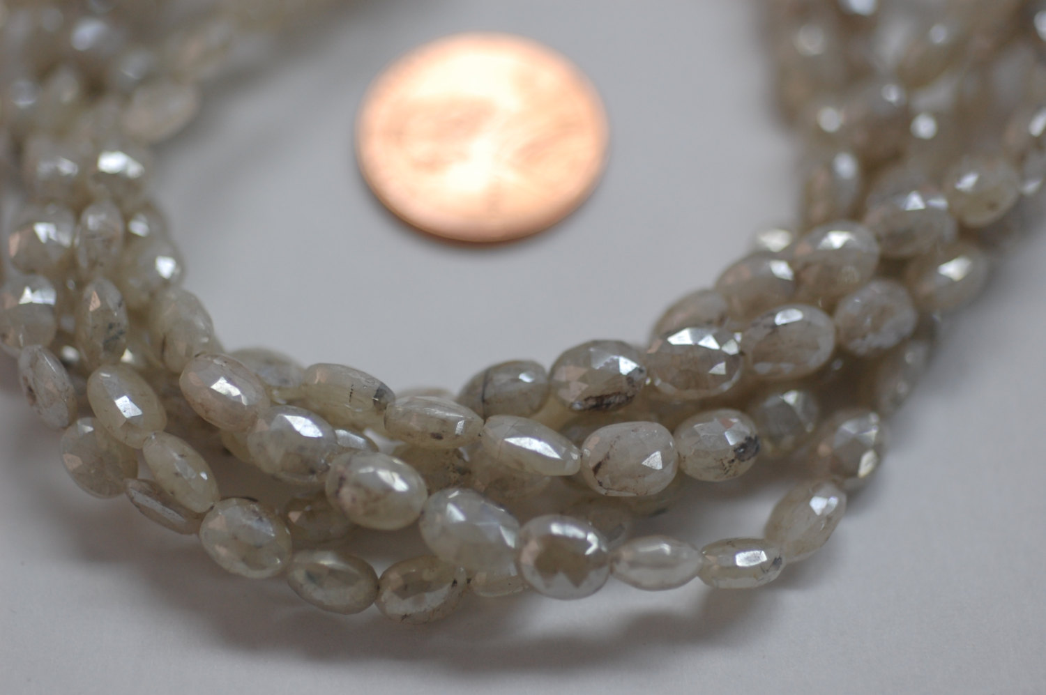 Ivory Mystic Corundum Oval Faceted (Coated)
