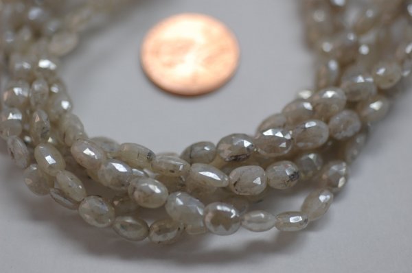 Ivory Mystic Corundum Oval Faceted (Coated)