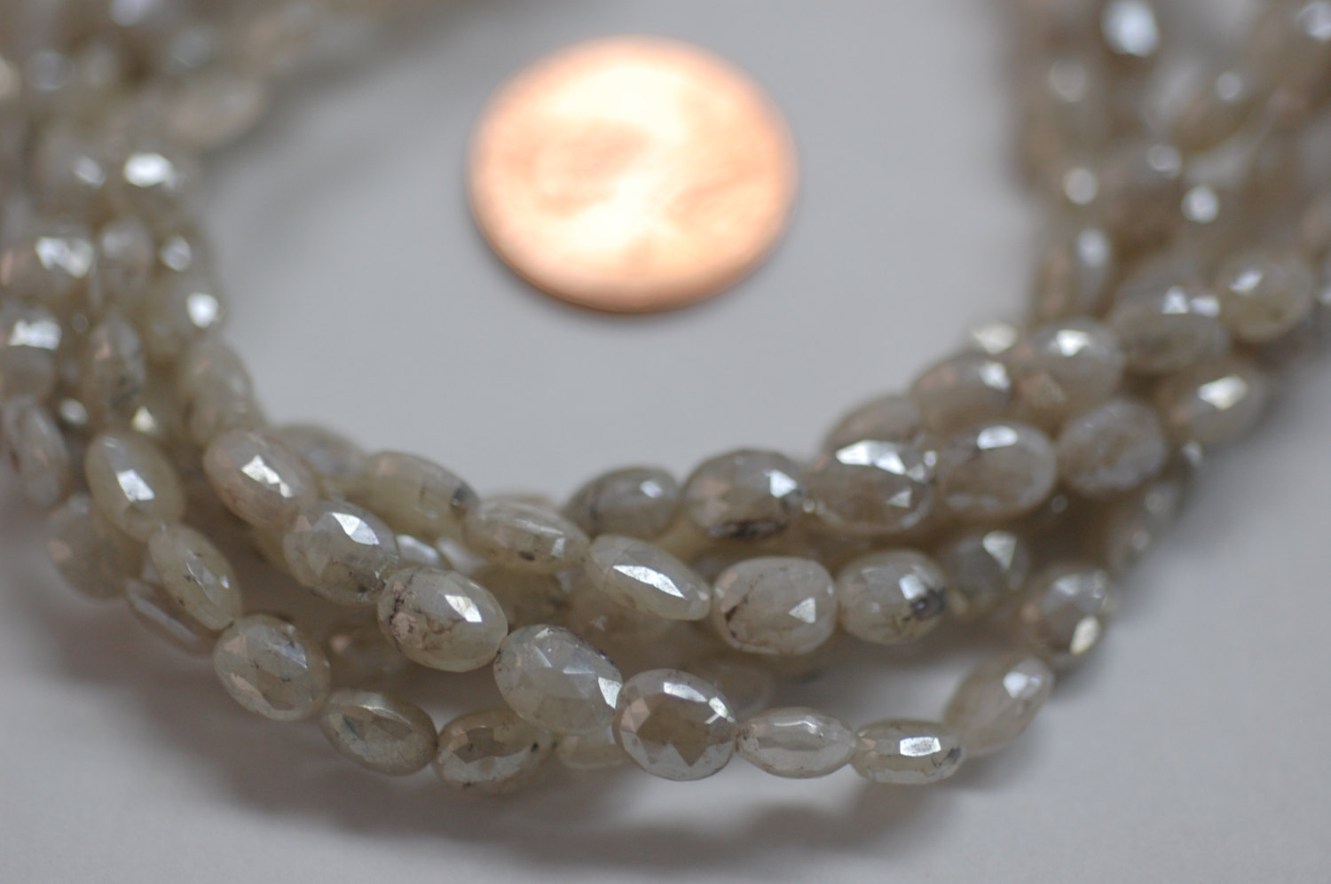 Ivory Mystic Corundum Oval Faceted (Coated)