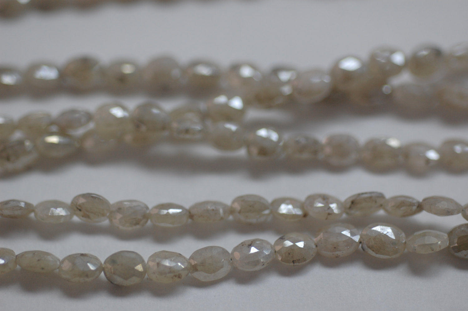 Ivory Mystic Corundum Oval Faceted (Coated)
