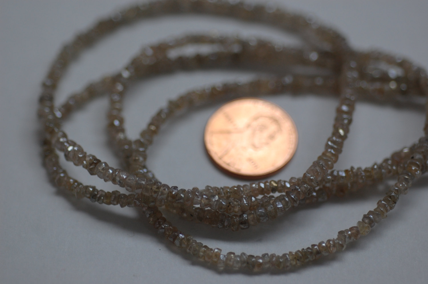Ivory Zircon Rondelle Faceted (Coated)