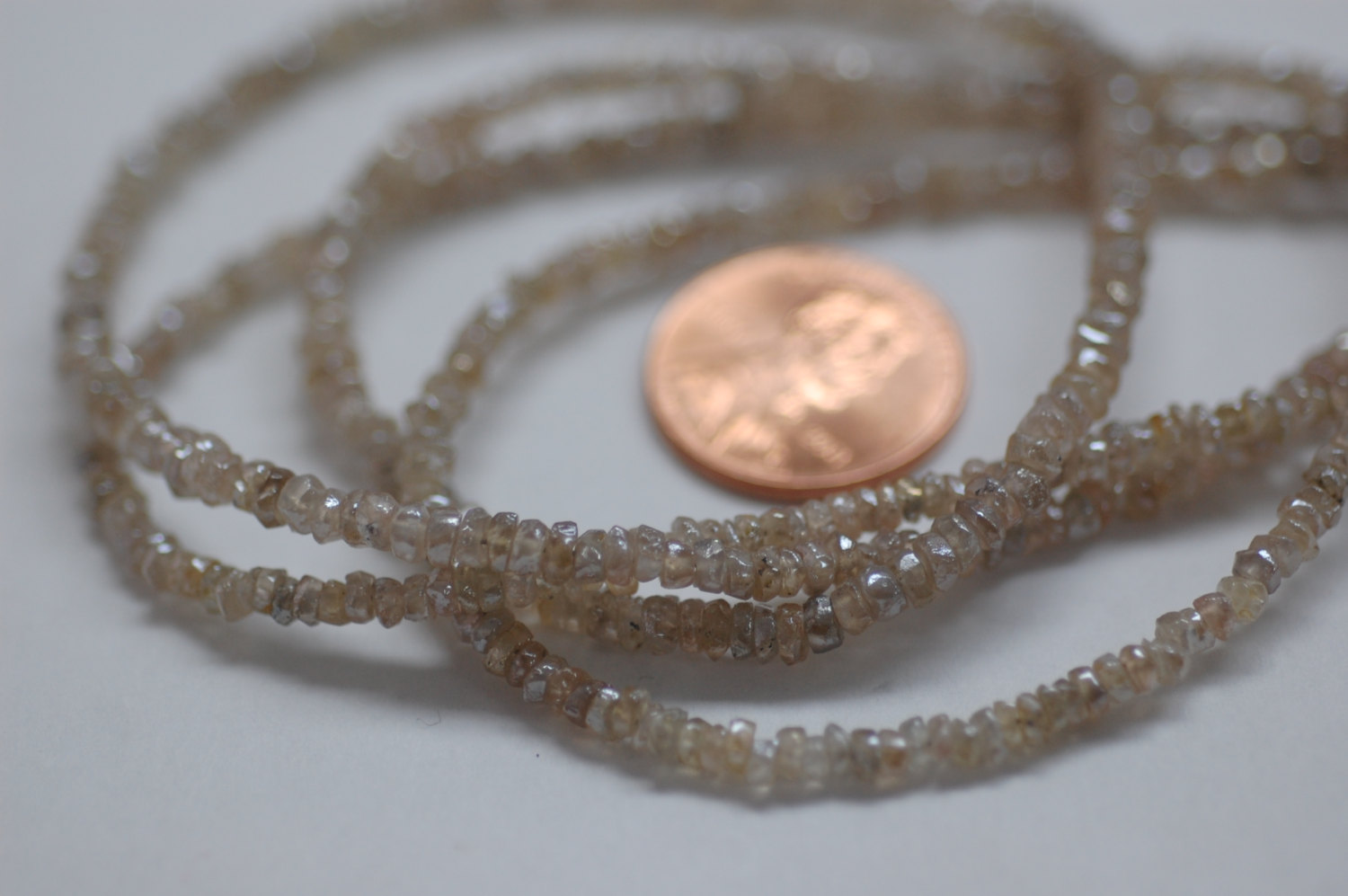 Ivory Zircon Rondelle Faceted (Coated)