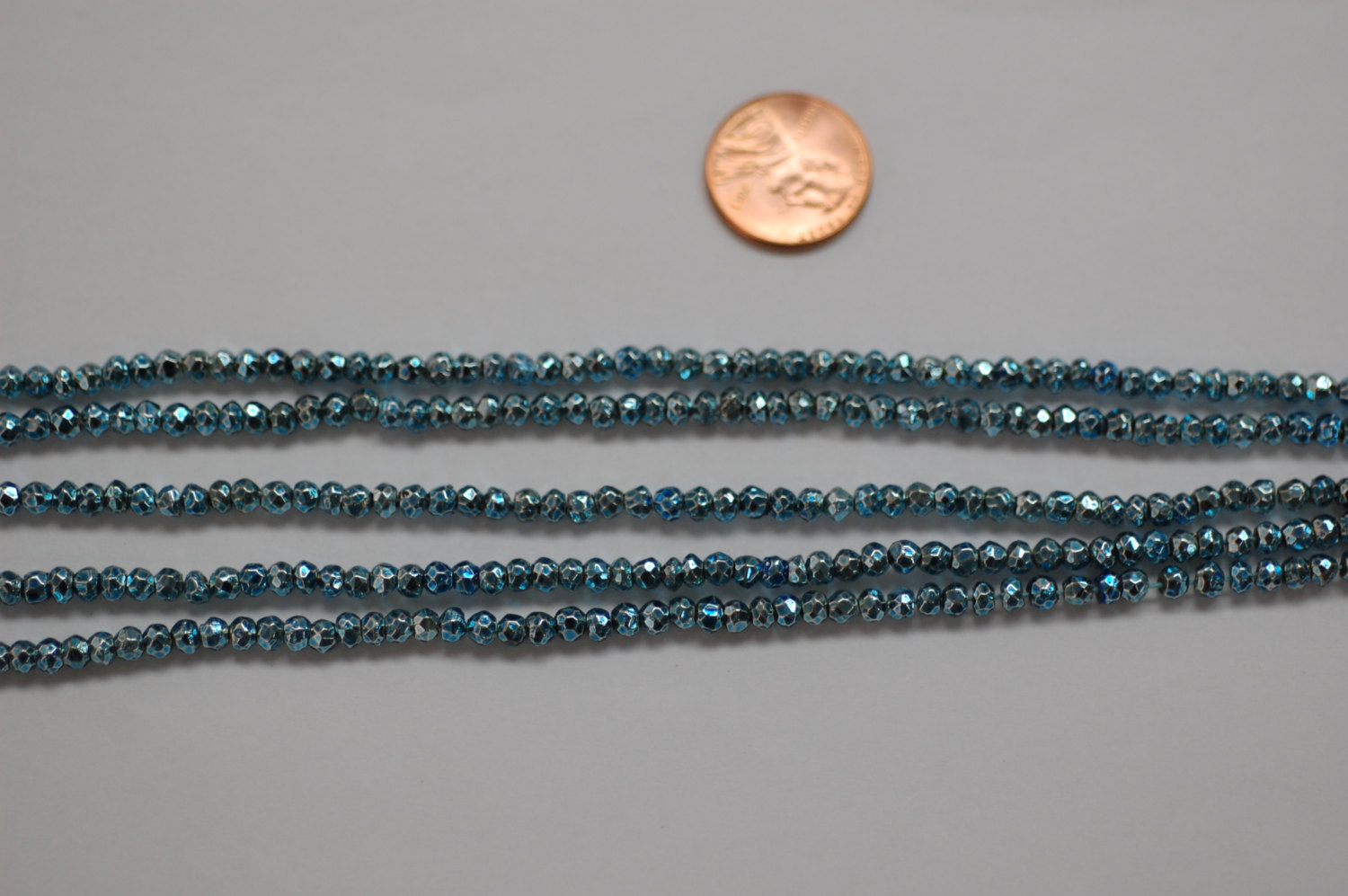 Light Blue Pyrite Rondelle Faceted