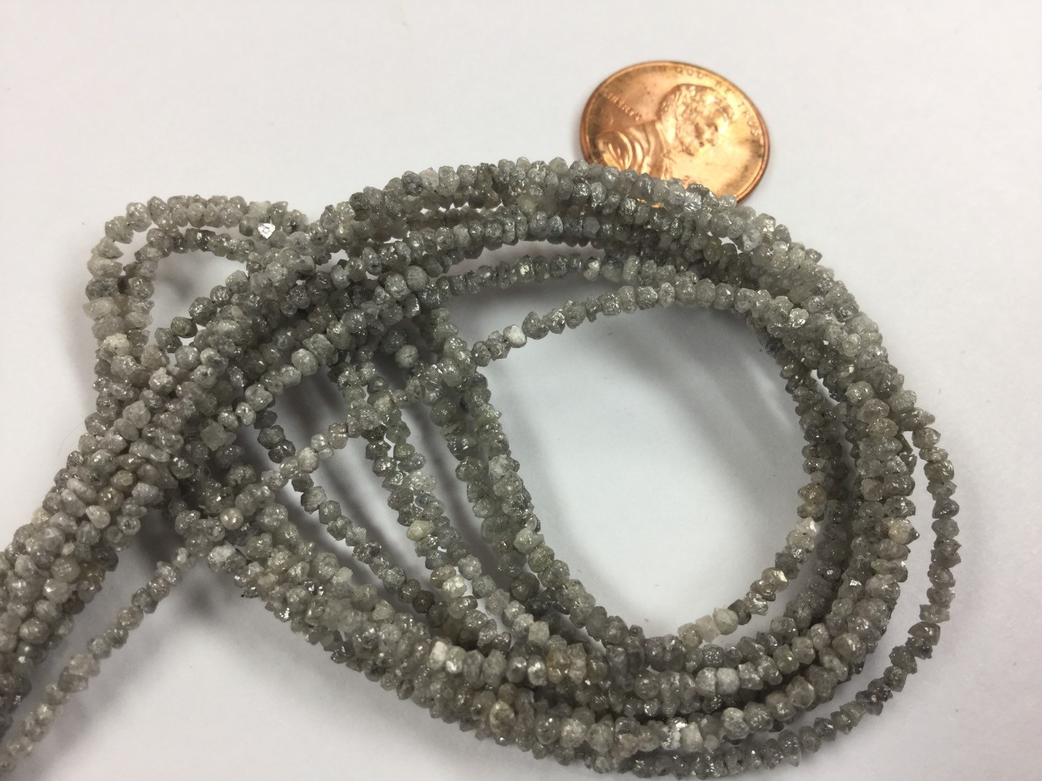 Light Grey Rough Cut Diamonds Faceted