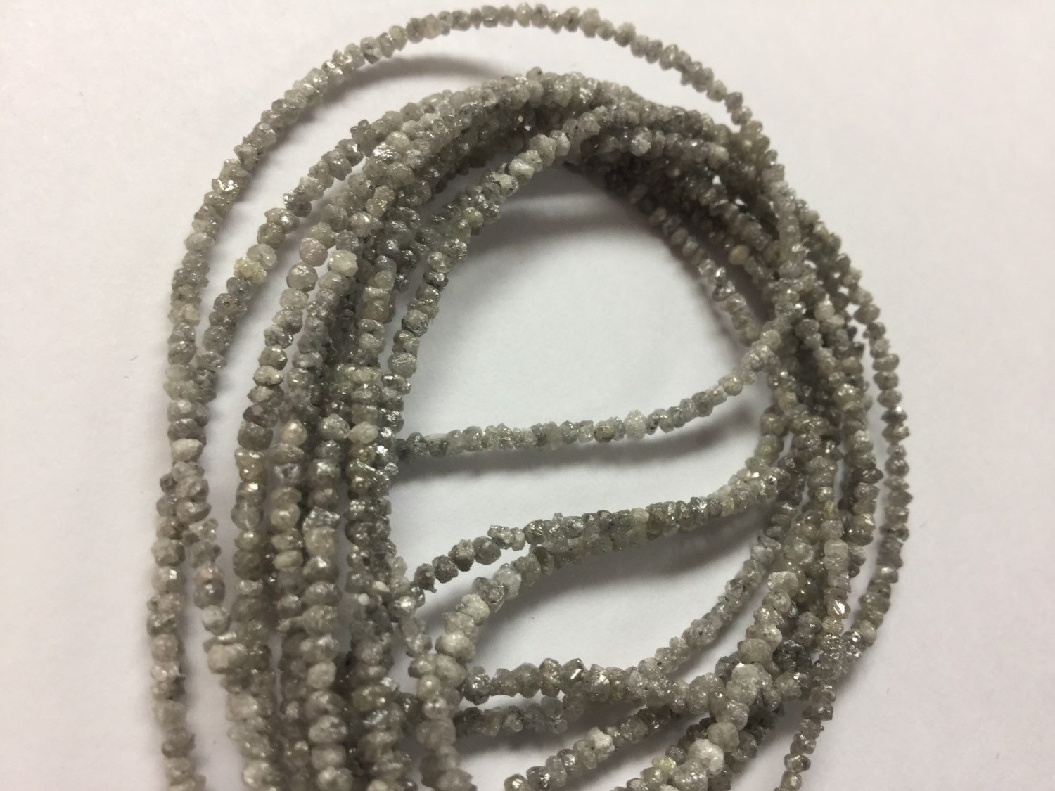 Light Grey Rough Cut Diamonds Faceted
