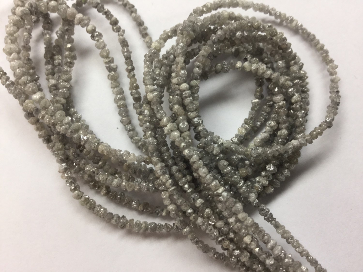 Light Grey Rough Cut Diamonds Faceted