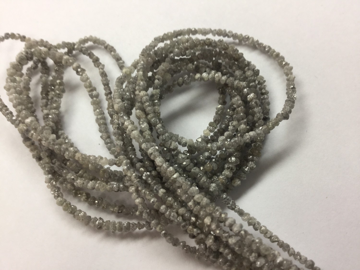 Light Grey Rough Cut Diamonds Faceted