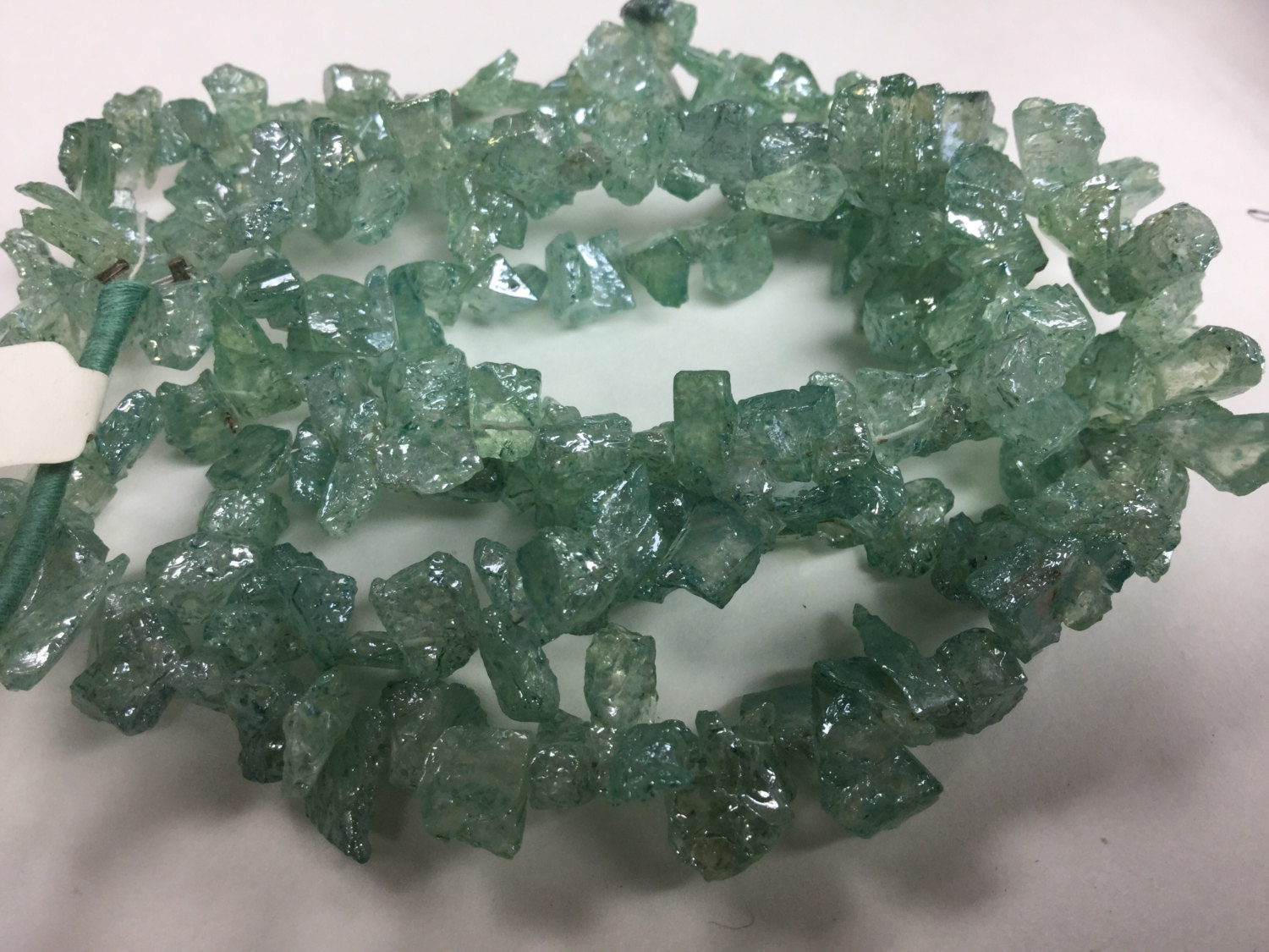 Coated Prehnite Funky Cut Faceted (Platinum Polished)
