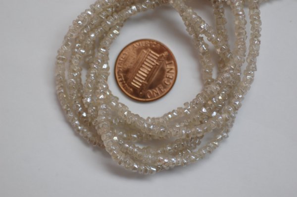 Off White Zircon Organic Cut Rondelle Faceted
