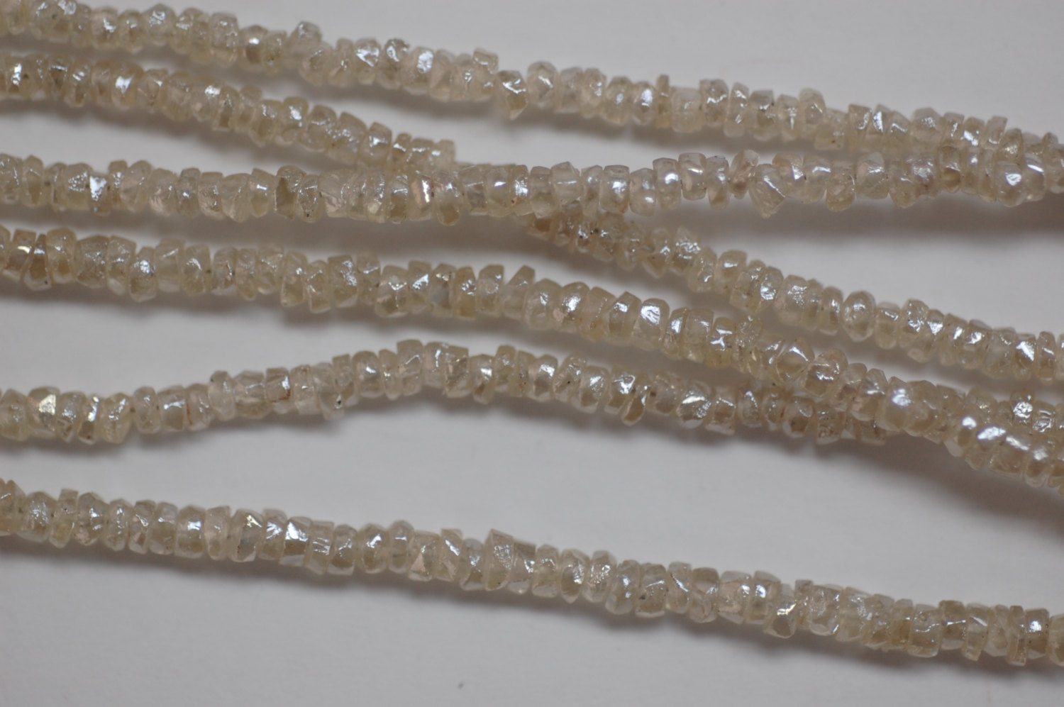 Off White Zircon Organic Cut Rondelle Faceted