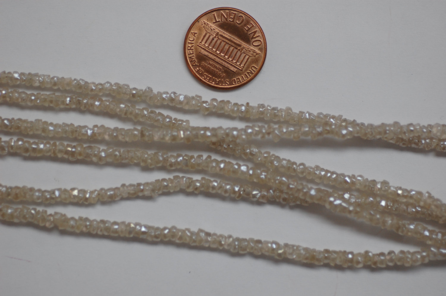 Off White Zircon Organic Cut Rondelle Faceted