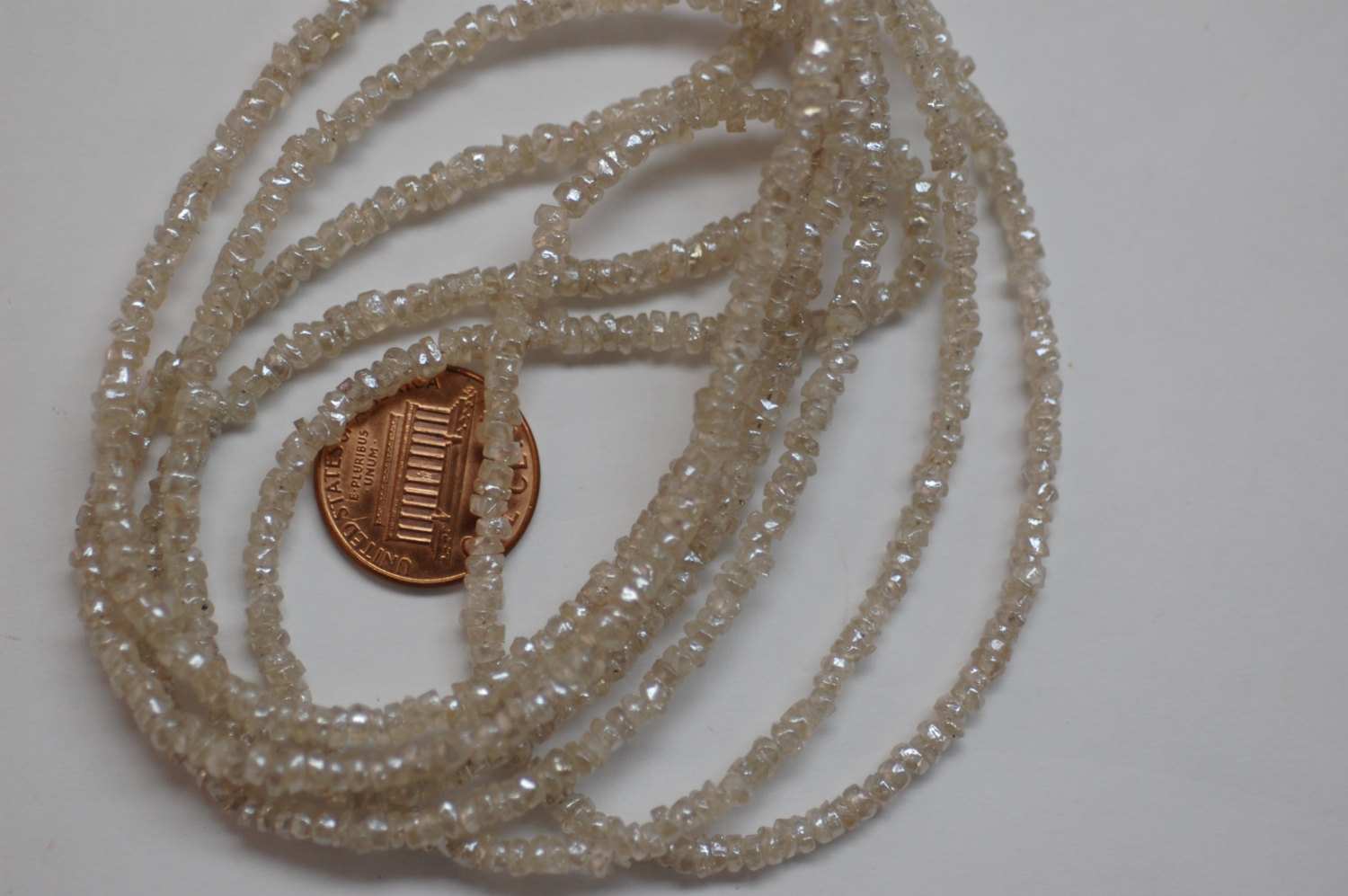 Off White Zircon Organic Cut Rondelle Faceted