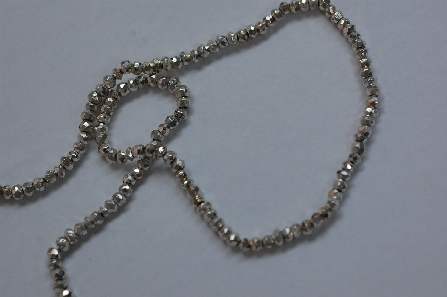 Pyrite Rondelle Silver Coated