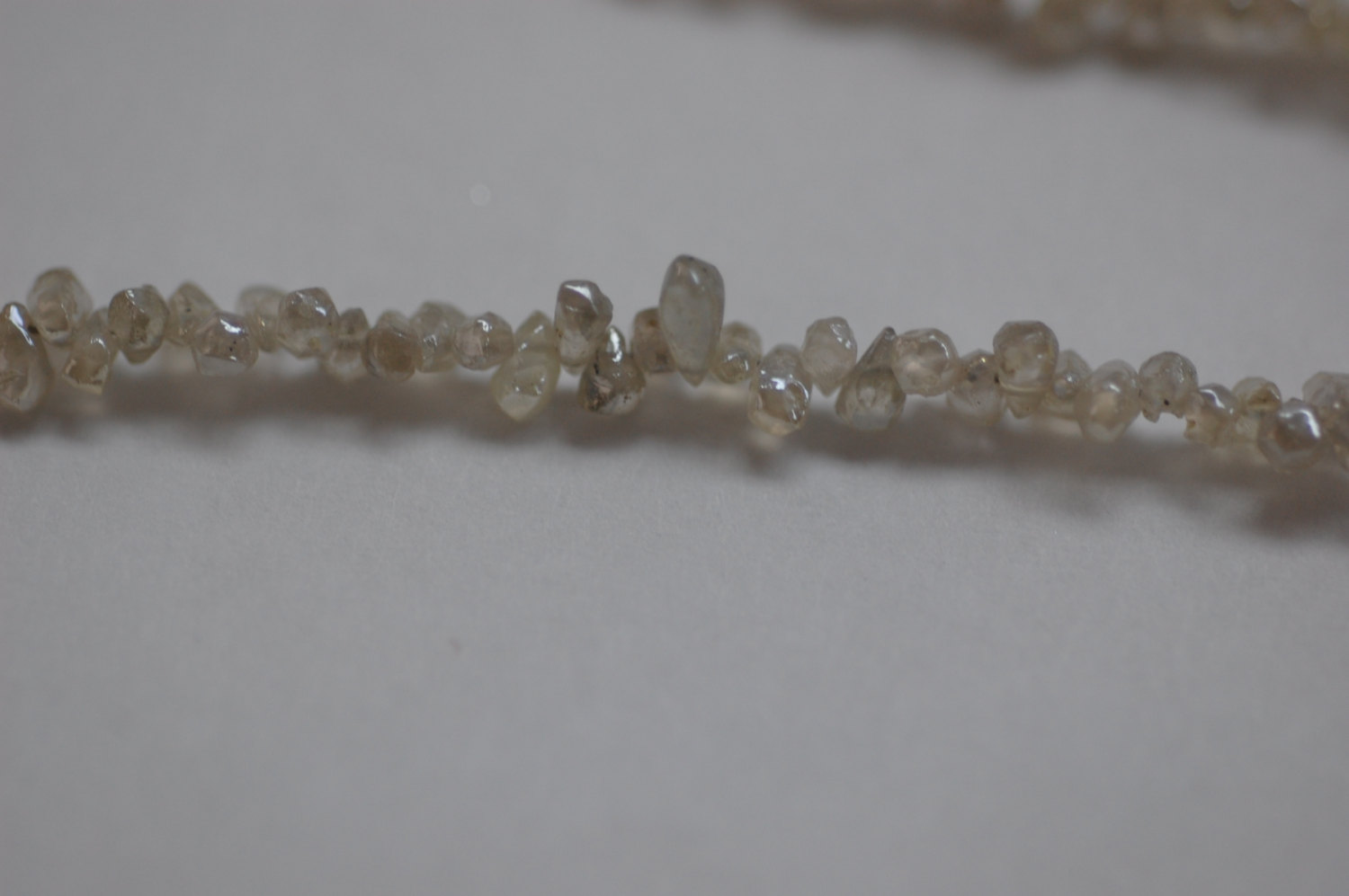 Rough Cut Drop Ivory Natural Zircon Faceted (Platinum Polished)
