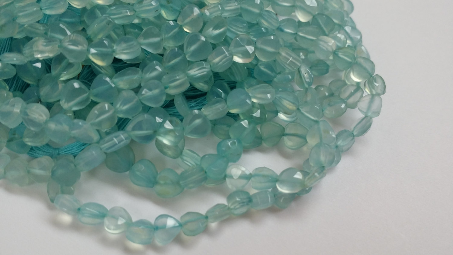 Chalcedony  Straight Drilled Hearts Faceted