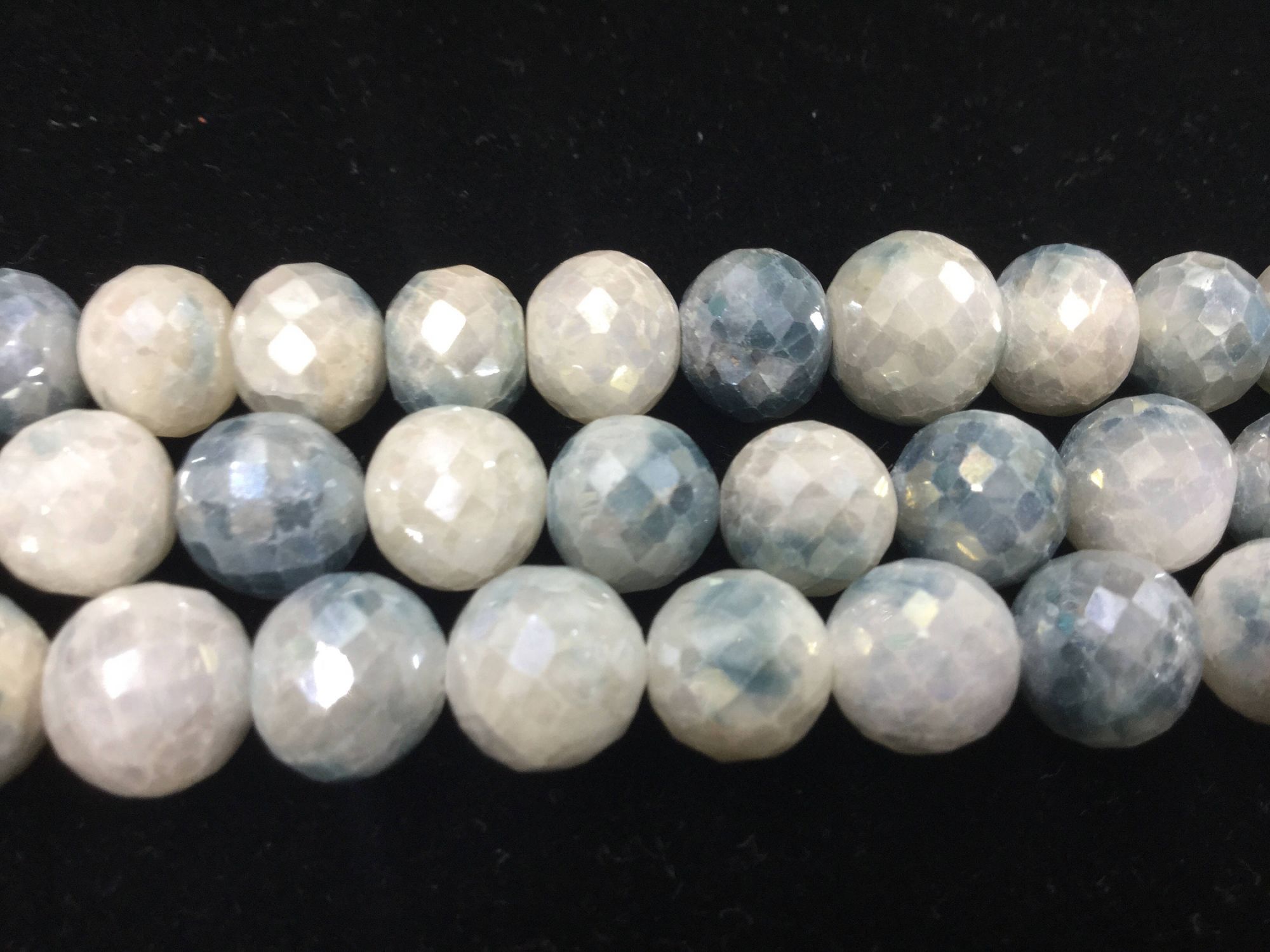 Shaded Blue Corundum Rounds Faceted