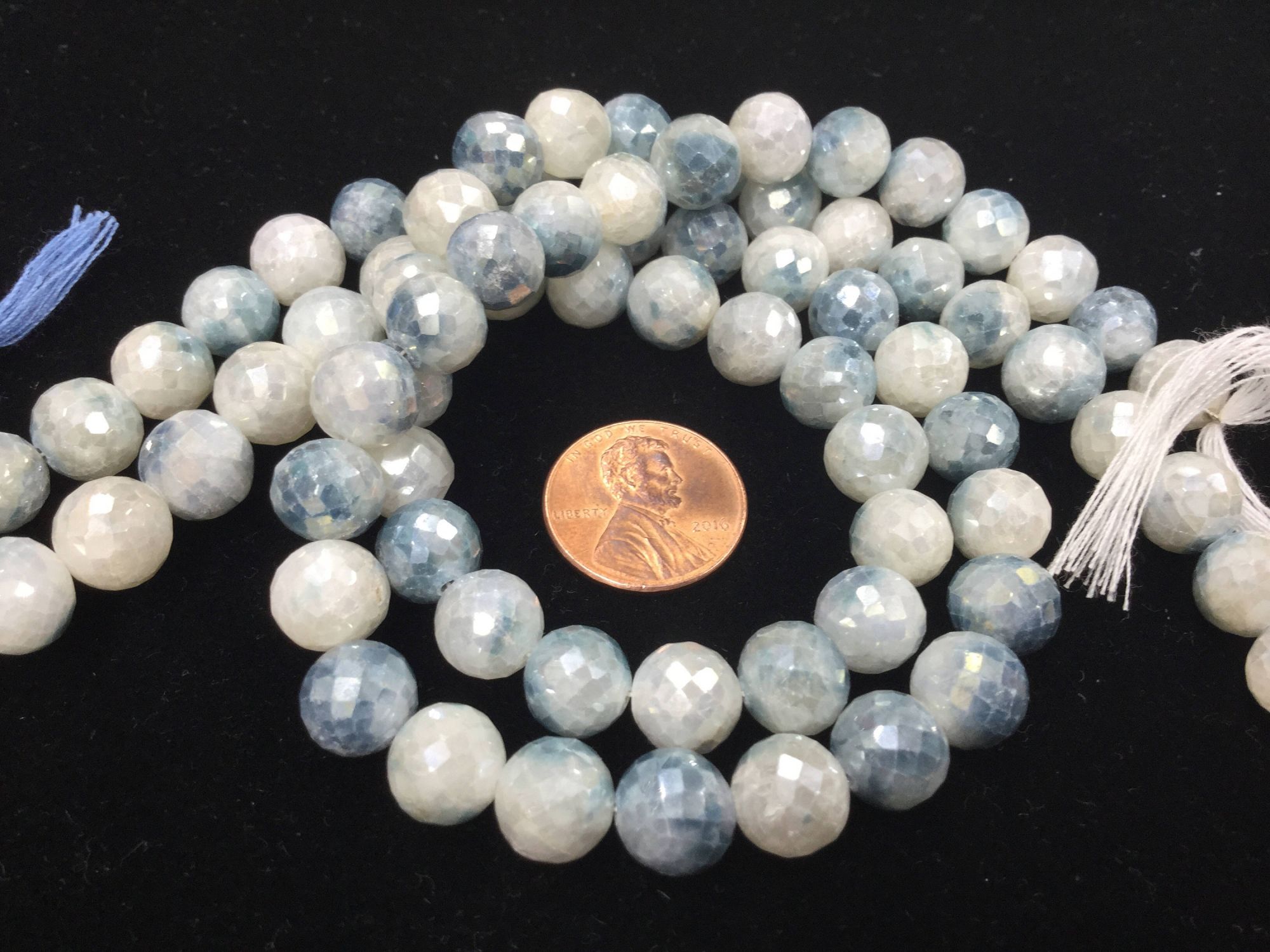 Shaded Blue Corundum Rounds Faceted