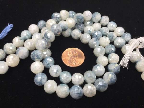 Shaded Blue Corundum Rounds Faceted