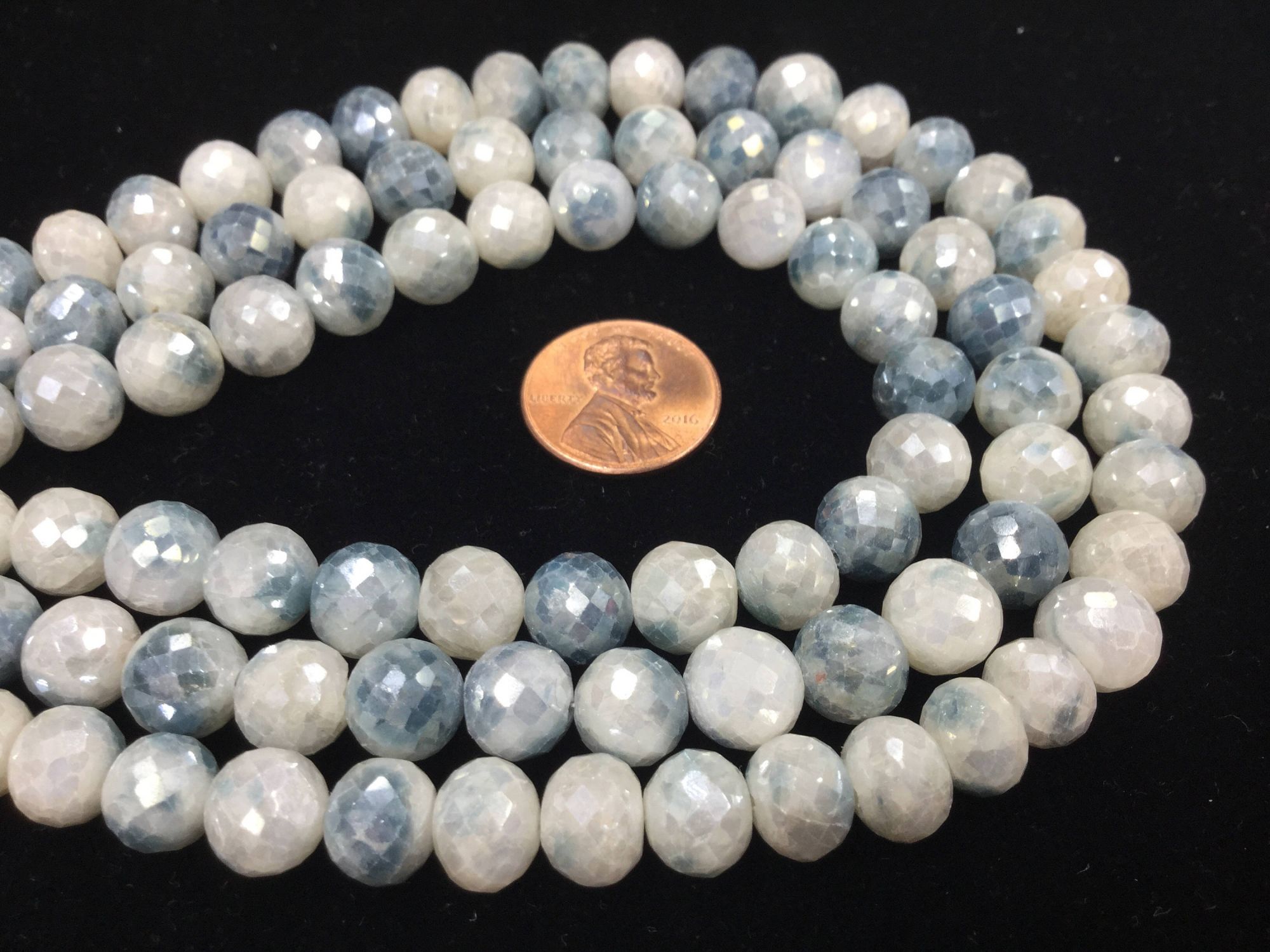 Shaded Blue Corundum Rounds Faceted