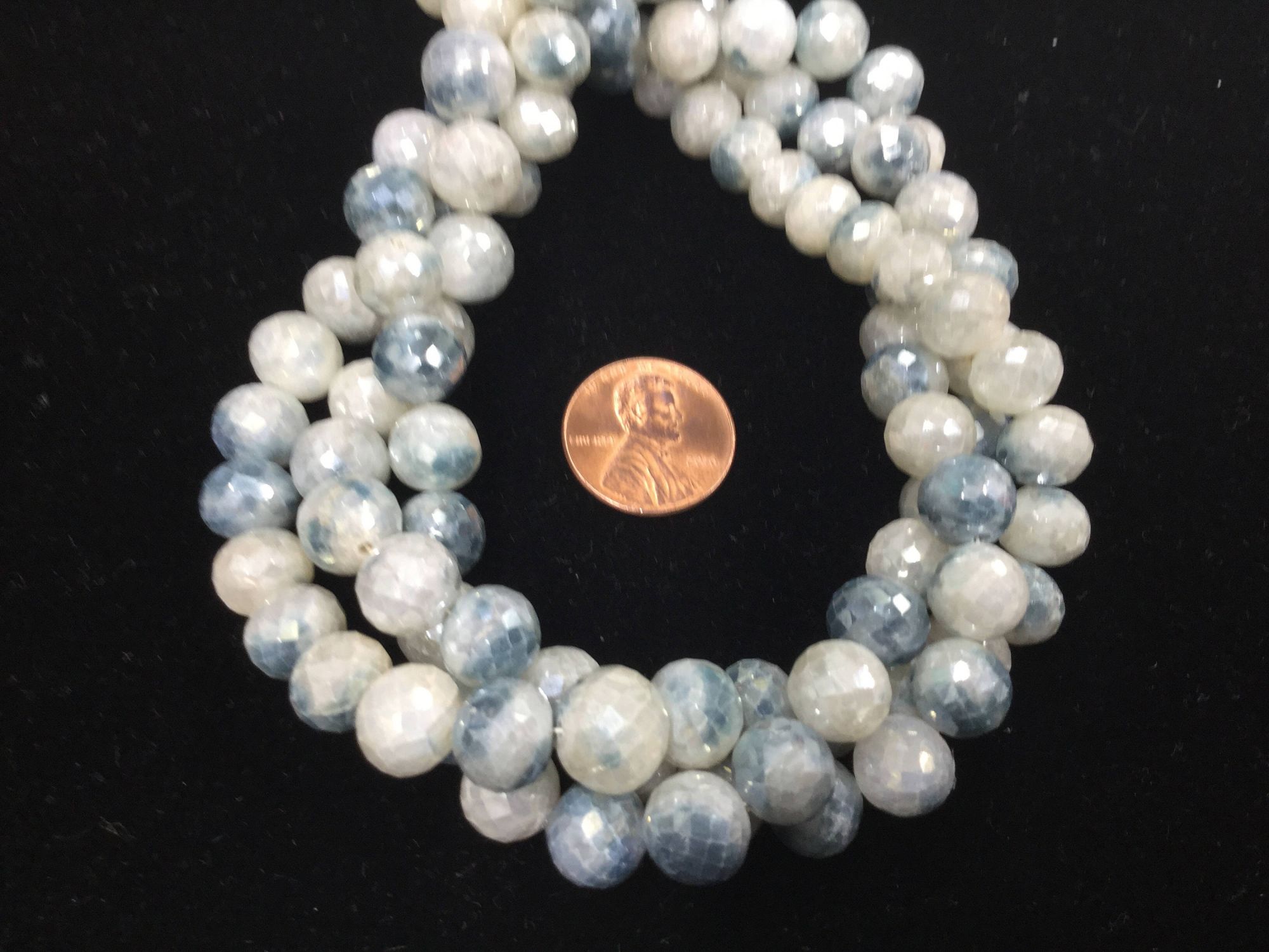Shaded Blue Corundum Rounds Faceted