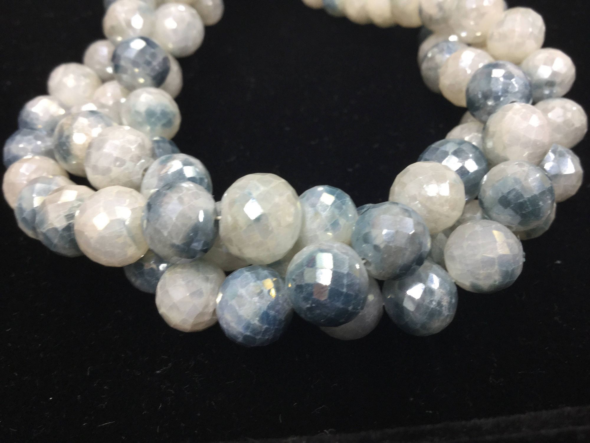 Shaded Blue Corundum Rounds Faceted