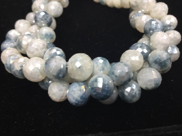 Shaded Blue Corundum Rounds Faceted