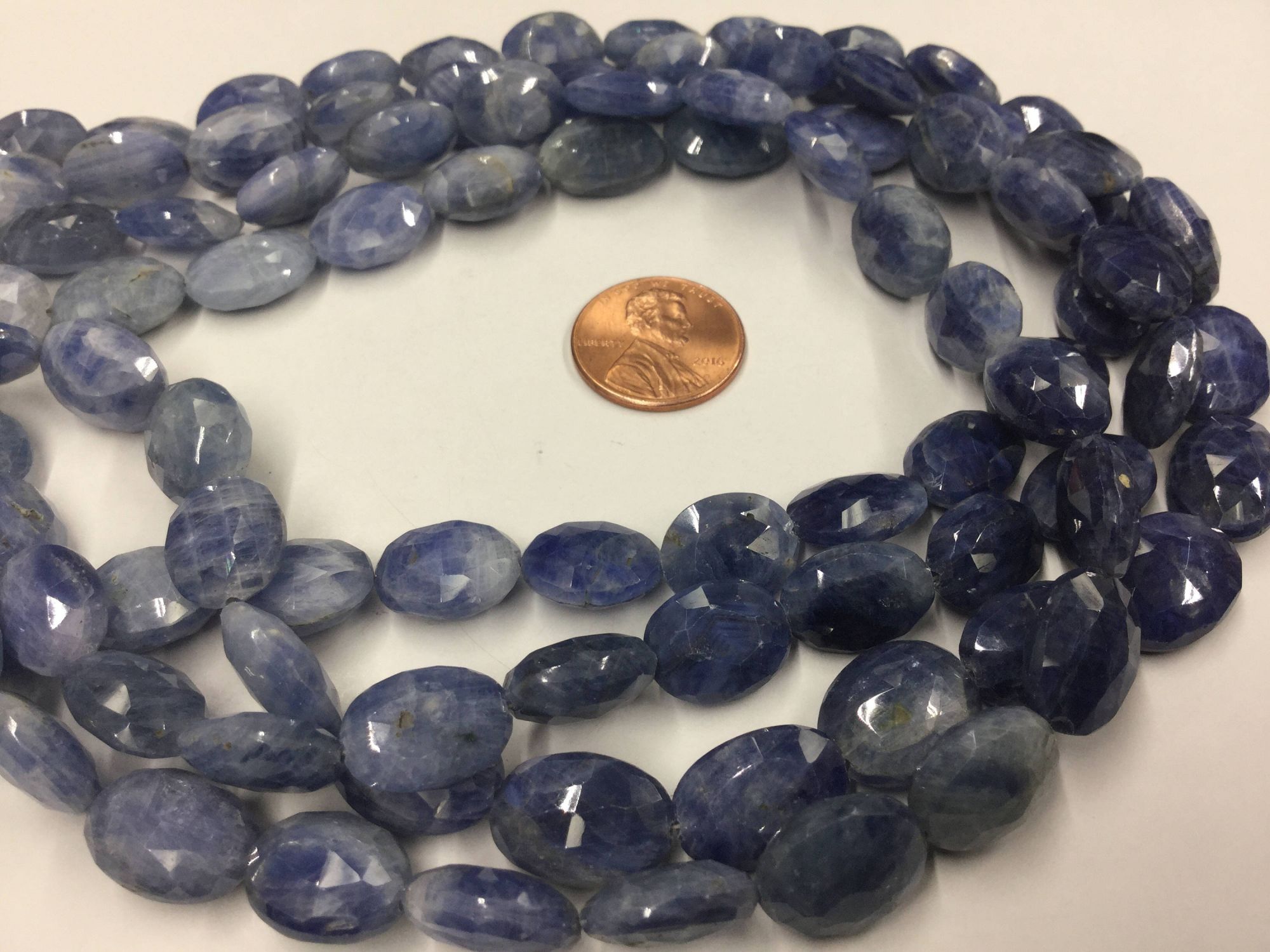 Shaded Blue Sapphire Ovals Faceted