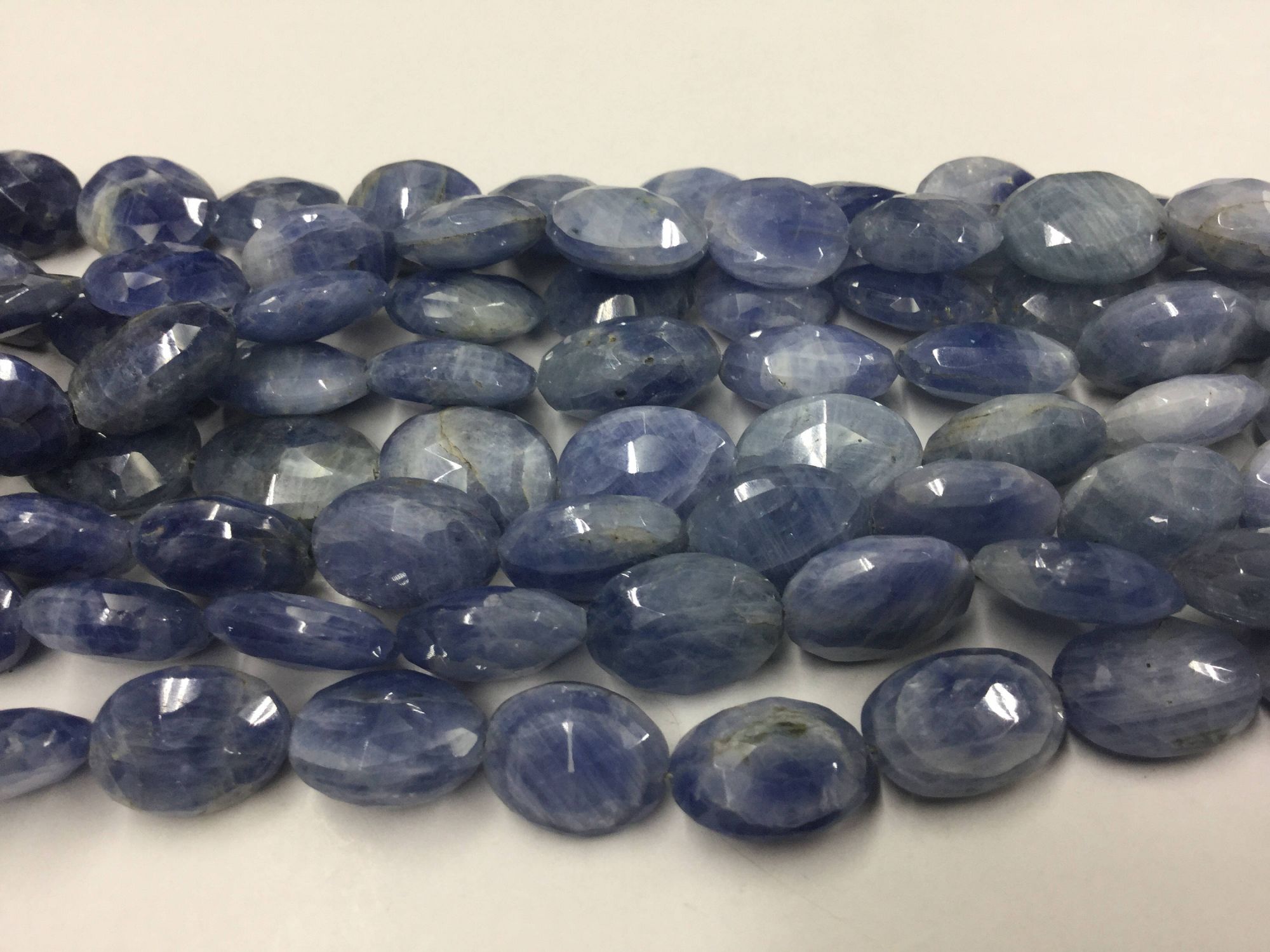 Shaded Blue Sapphire Ovals Faceted
