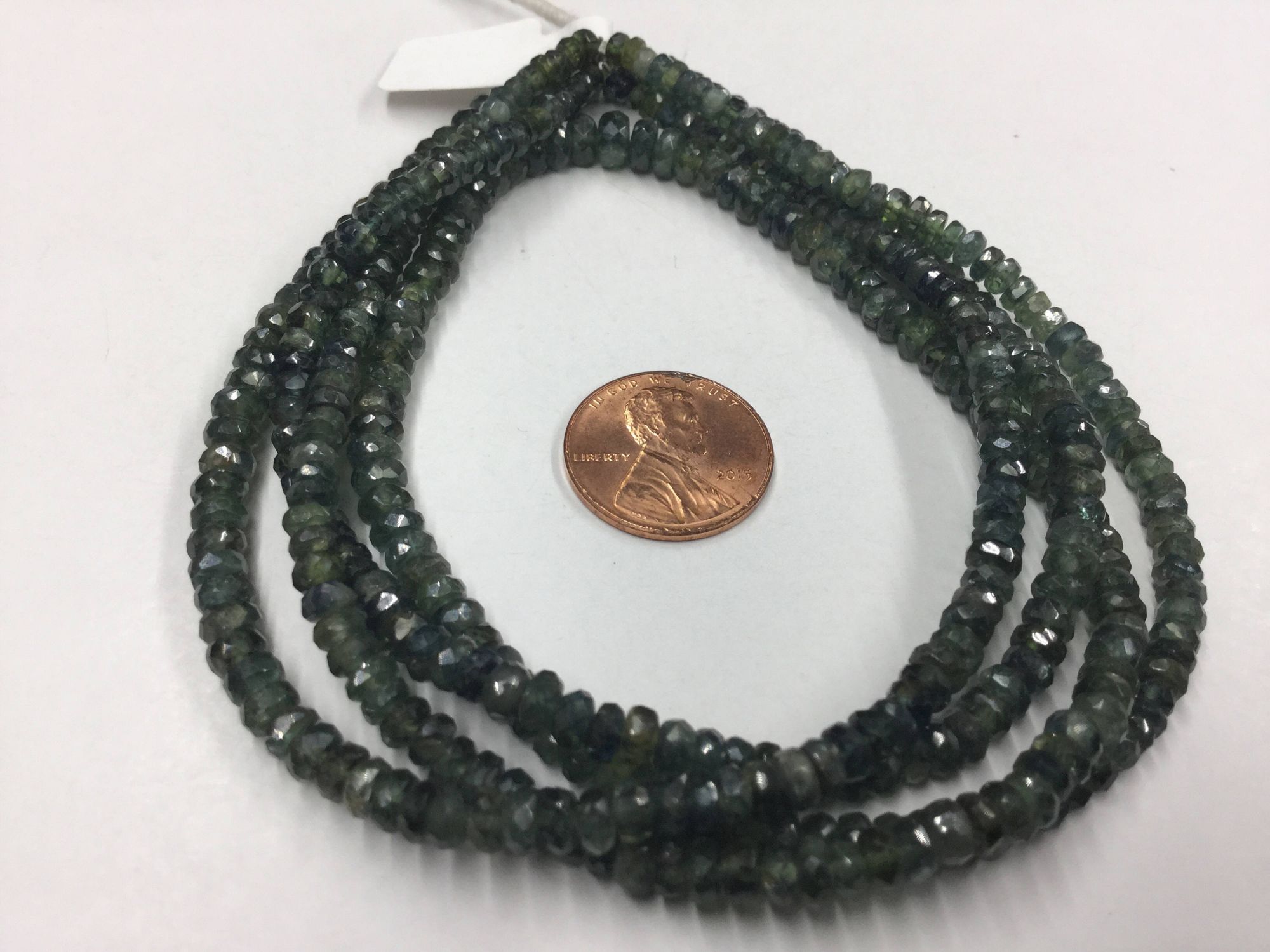 Shaded Green Sapphire Rondelles Faceted