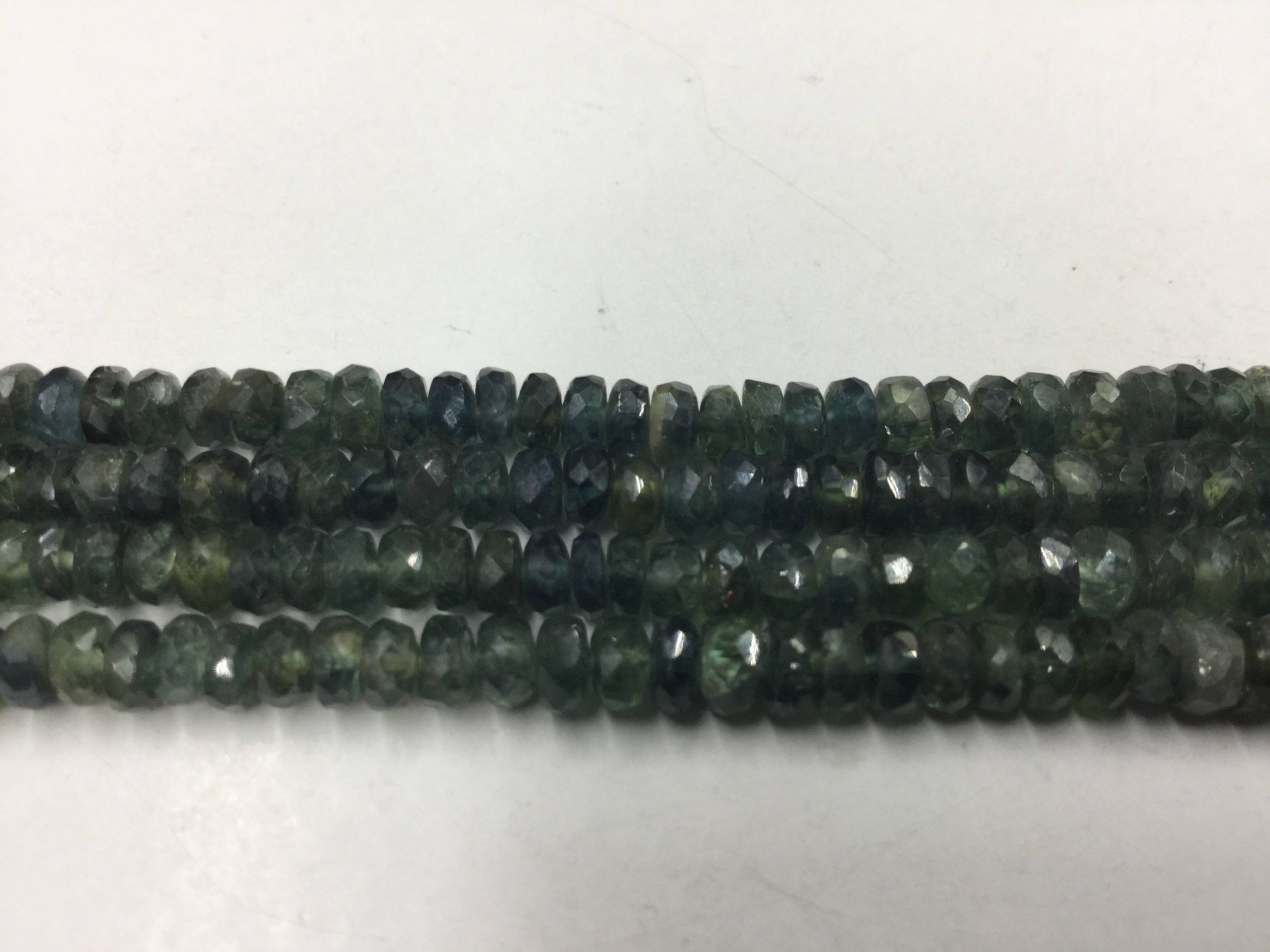 Shaded Green Sapphire Rondelles Faceted