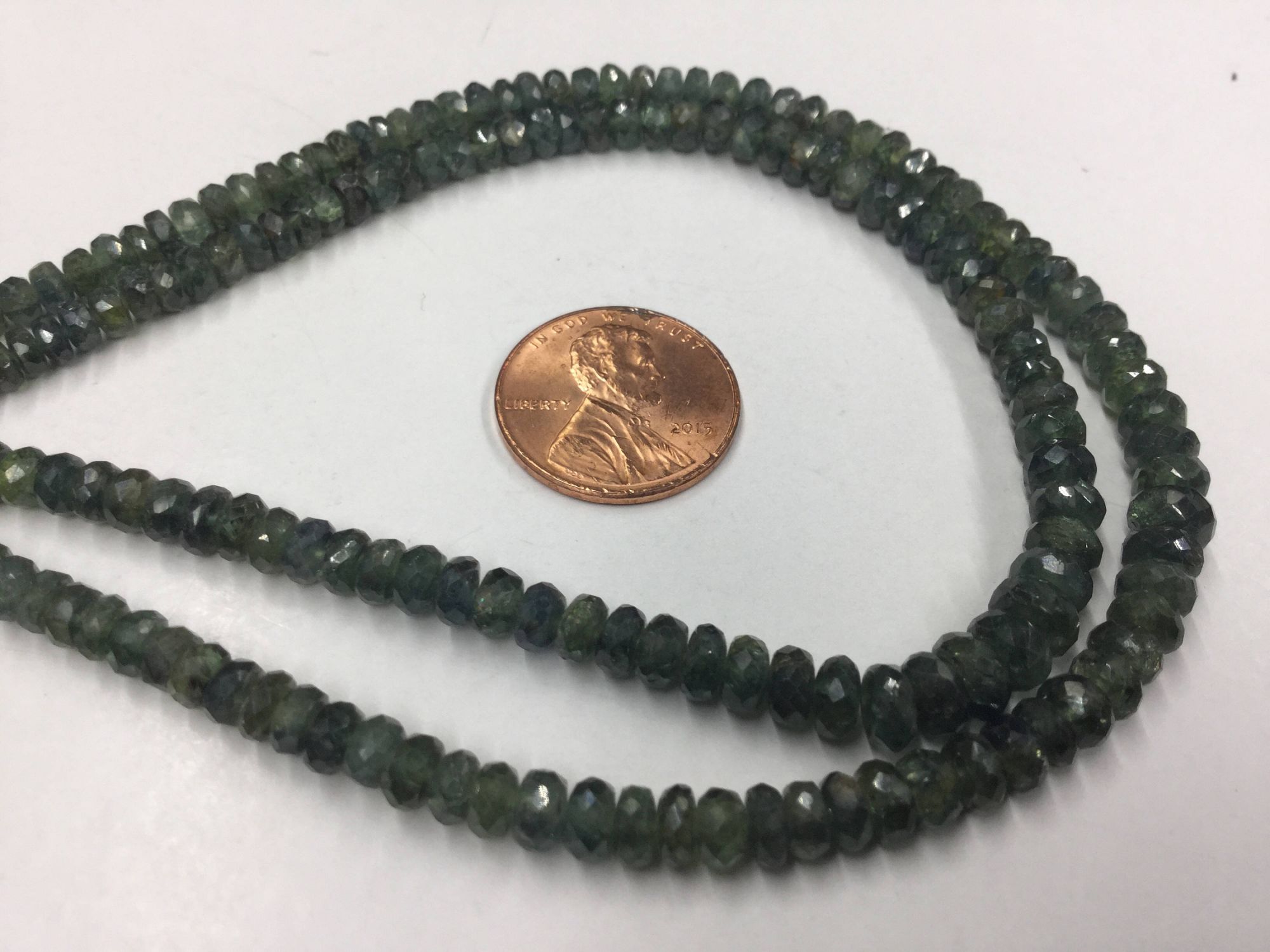 Shaded Green Sapphire Rondelles Faceted