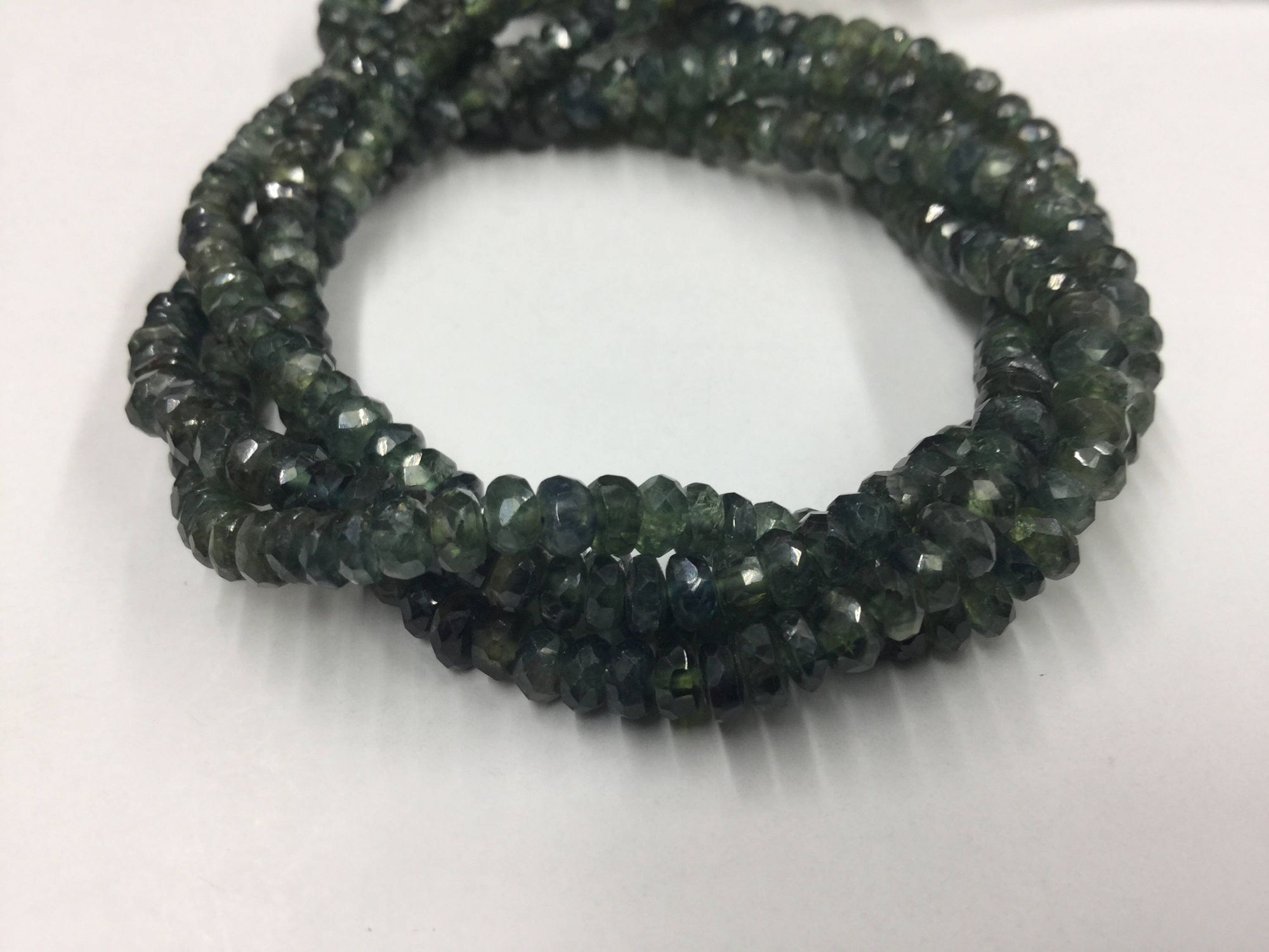 Shaded Green Sapphire Rondelles Faceted