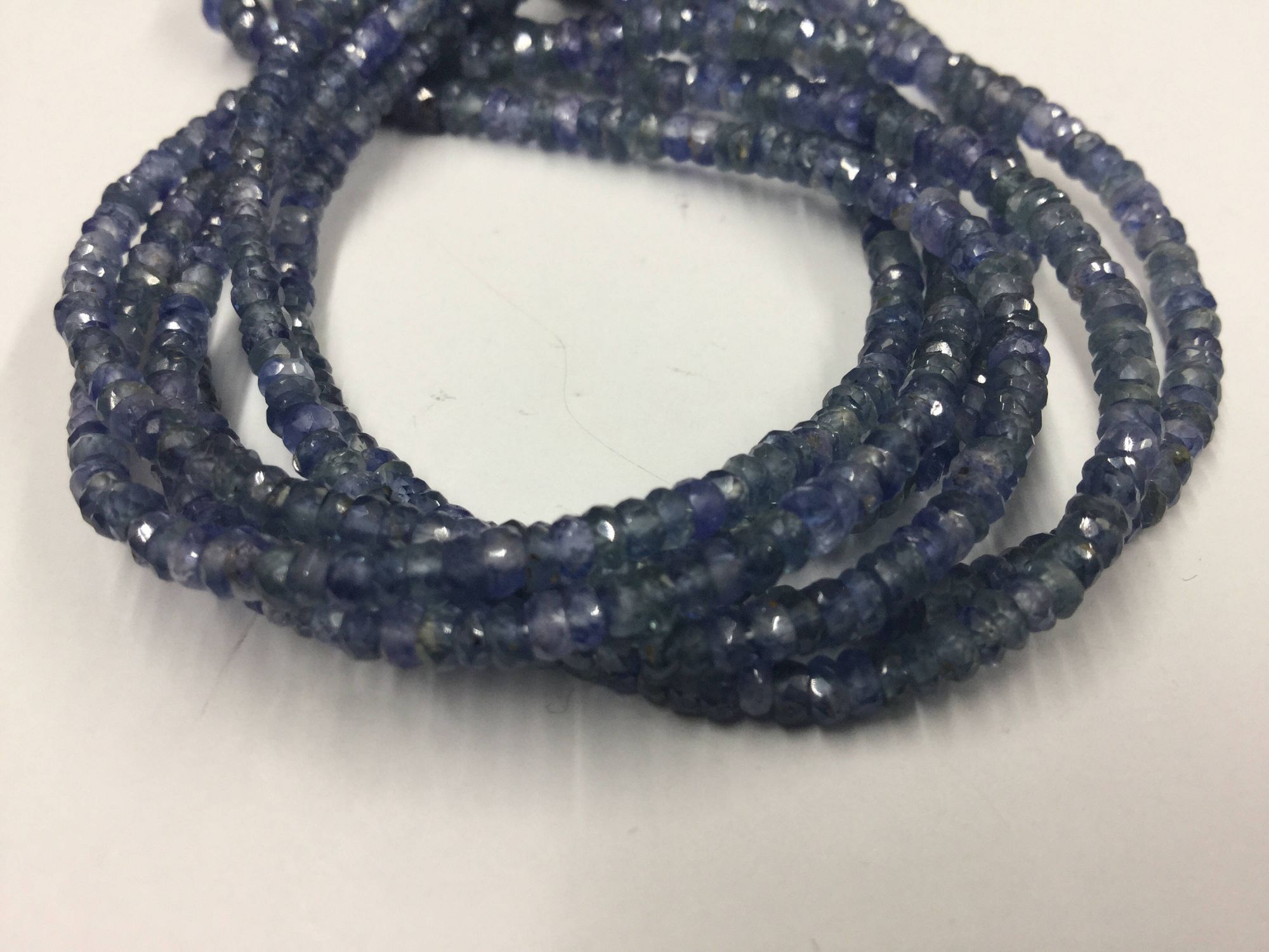 Shaded Light Blue Sapphire Rondelles Faceted