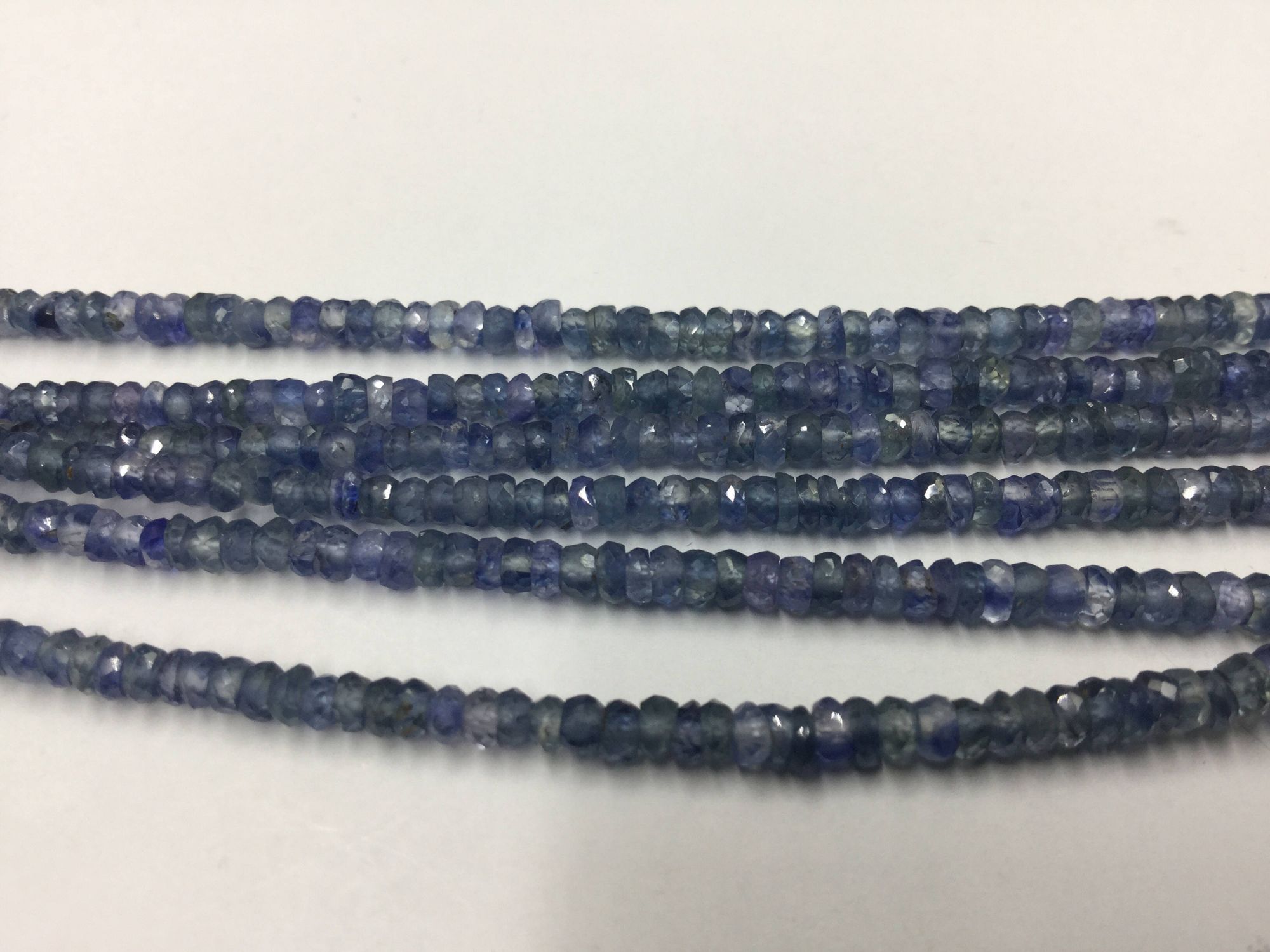 Shaded Light Blue Sapphire Rondelles Faceted